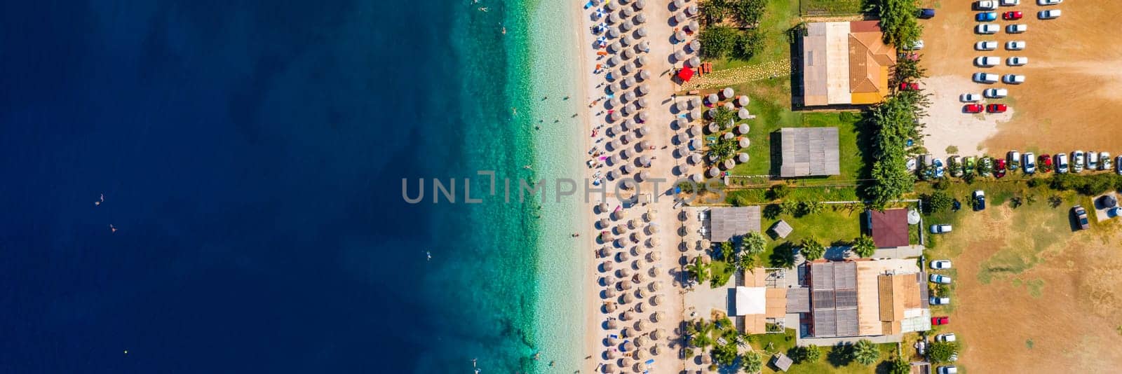 Beautiful crystal clear azure water at Antisamos beach on Kefalonia island, Greece. Beautiful sea bay with Antisamos beach on Kefalonia island, Ionian island, Cephalonia, Antisamos beach, Greece. 