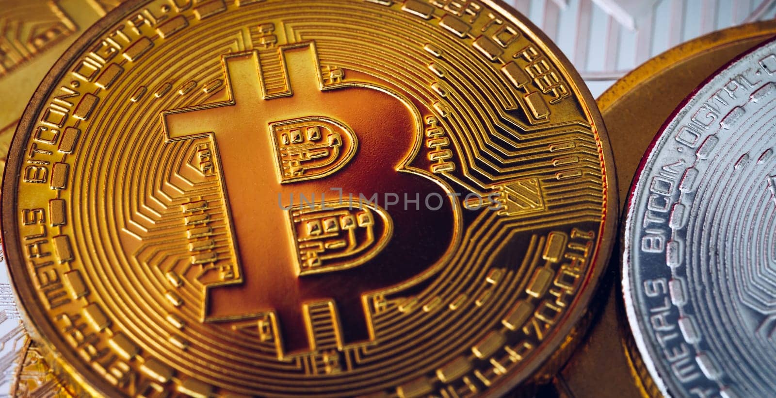 Stack of cryptocurrencies with a golden bitcoin. Bitcoin as most important cryptocurrency concept. Bitcoin. Physical bit coin. Digital currency. Cryptocurrency. Golden coin with bitcoin