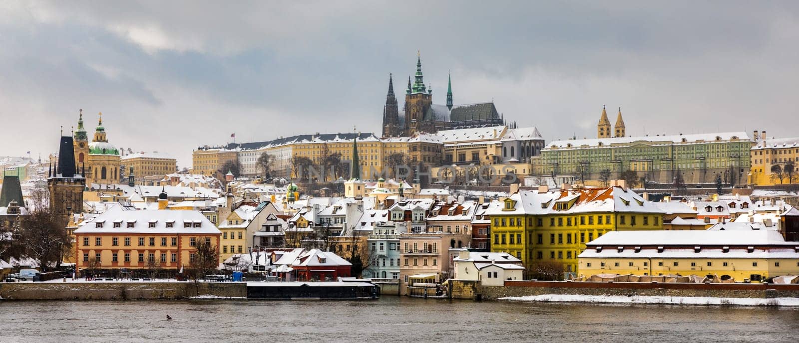 Famous historic Charles bridge in winter, Old Town bridge tower, Prague, Czech republic. Prague castle and Charles bridge, Prague (UNESCO), Czech republic.