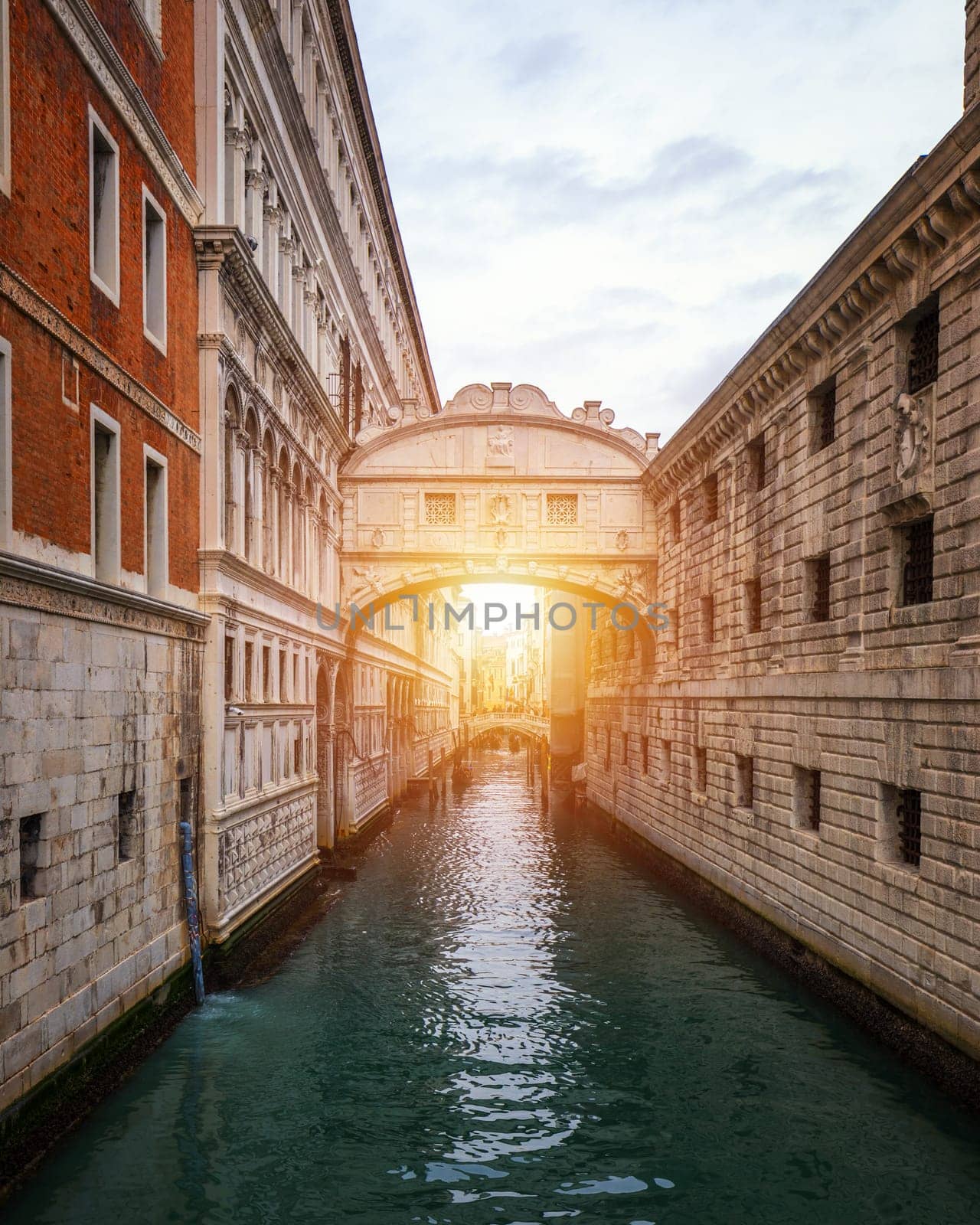 View of the Bridge of Sighs (Ponte dei Sospiri) and the Rio de Palazzo o de Canonica Canal from the Riva degli Schiavoni in Venice, Italy. The Ponte de la Canonica is visible in background.