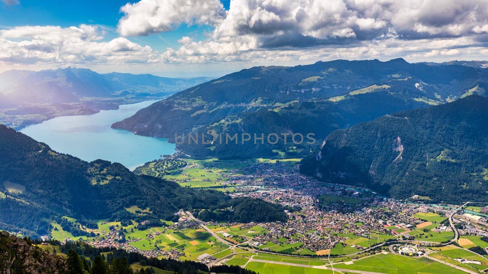 Beautiful Lake Thun view from Schynige Platte trail in Bernese Oberland, Canton of Bern, Switzerland. Popular mountain in the Swiss Alps called Schynige Platte in Switzerland, aerial view. by DaLiu