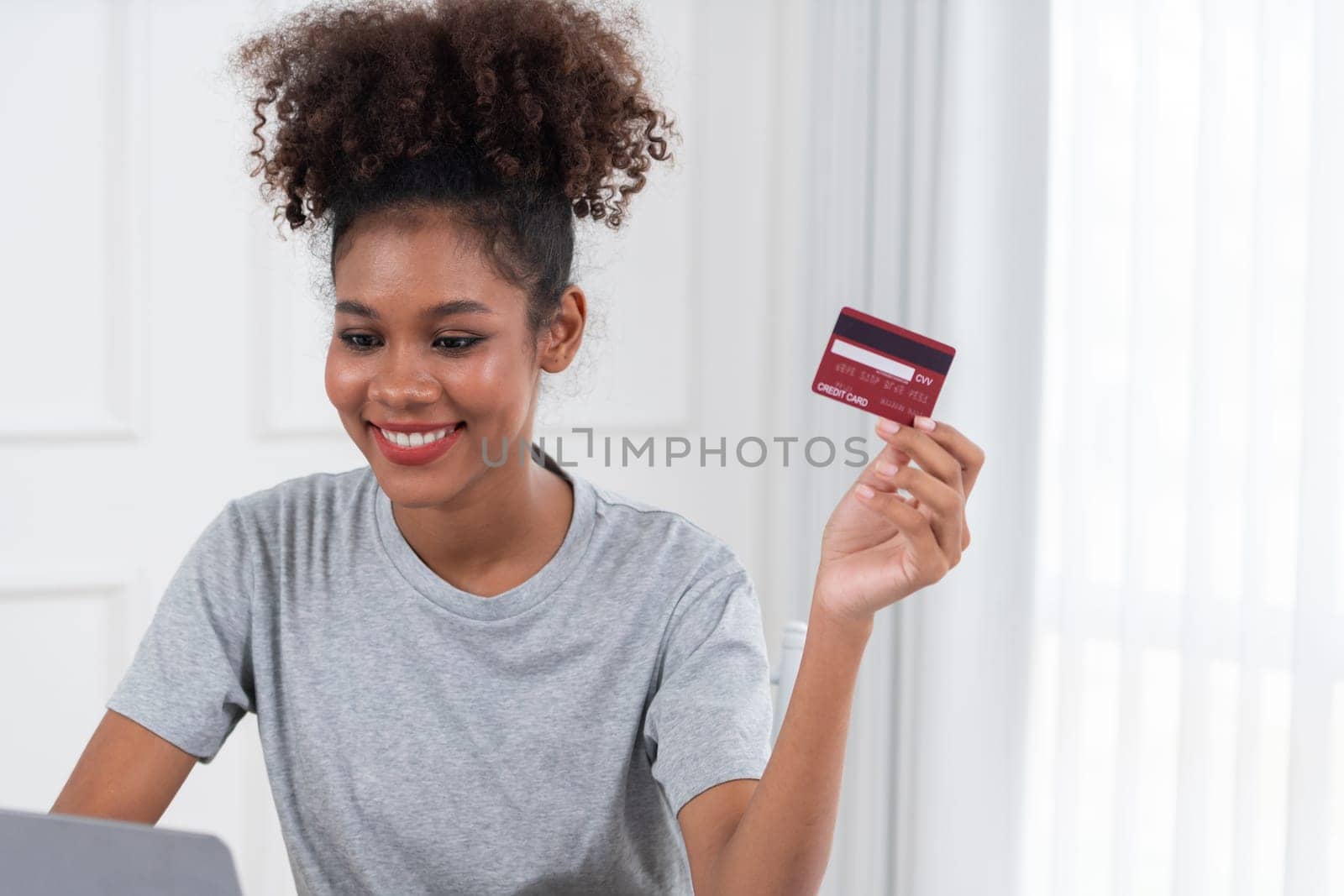Young happy woman buy product by online shopping with crucial security by biancoblue