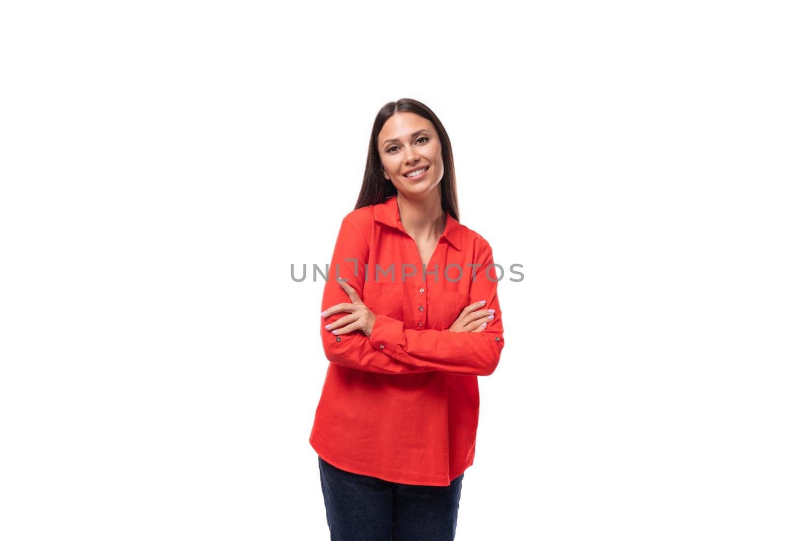 young pretty brunette secretary woman dressed in a red blouse on a white background with copy space.