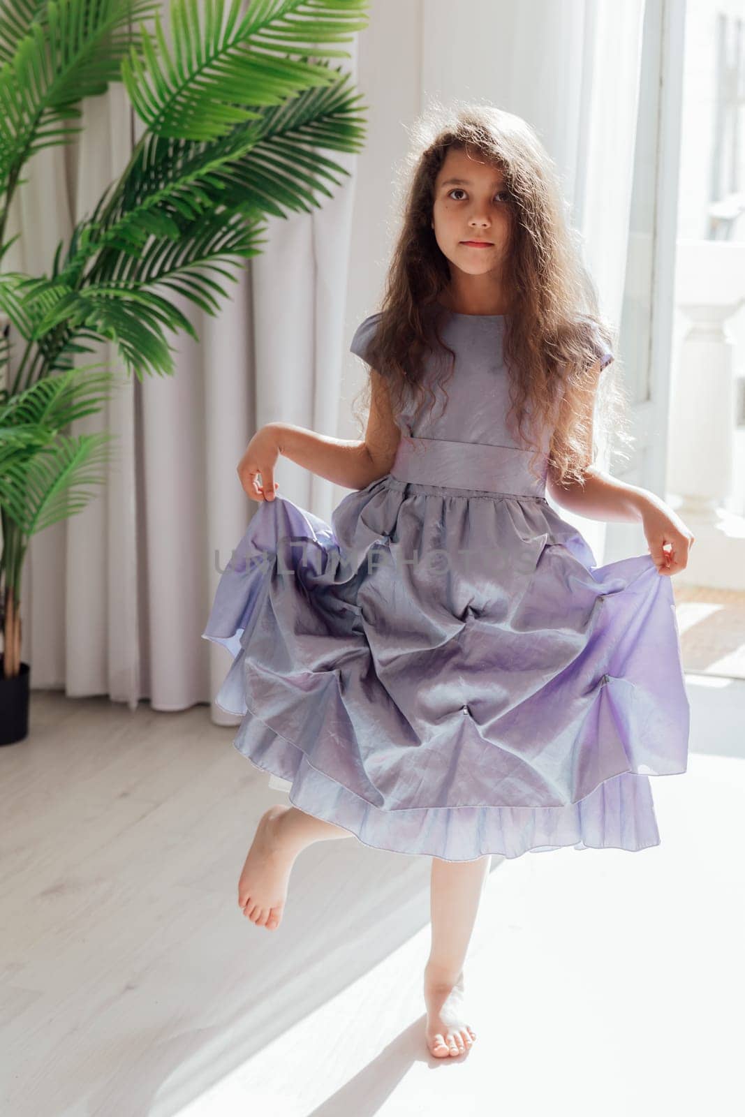 Beautiful girl 7 children in purple dress