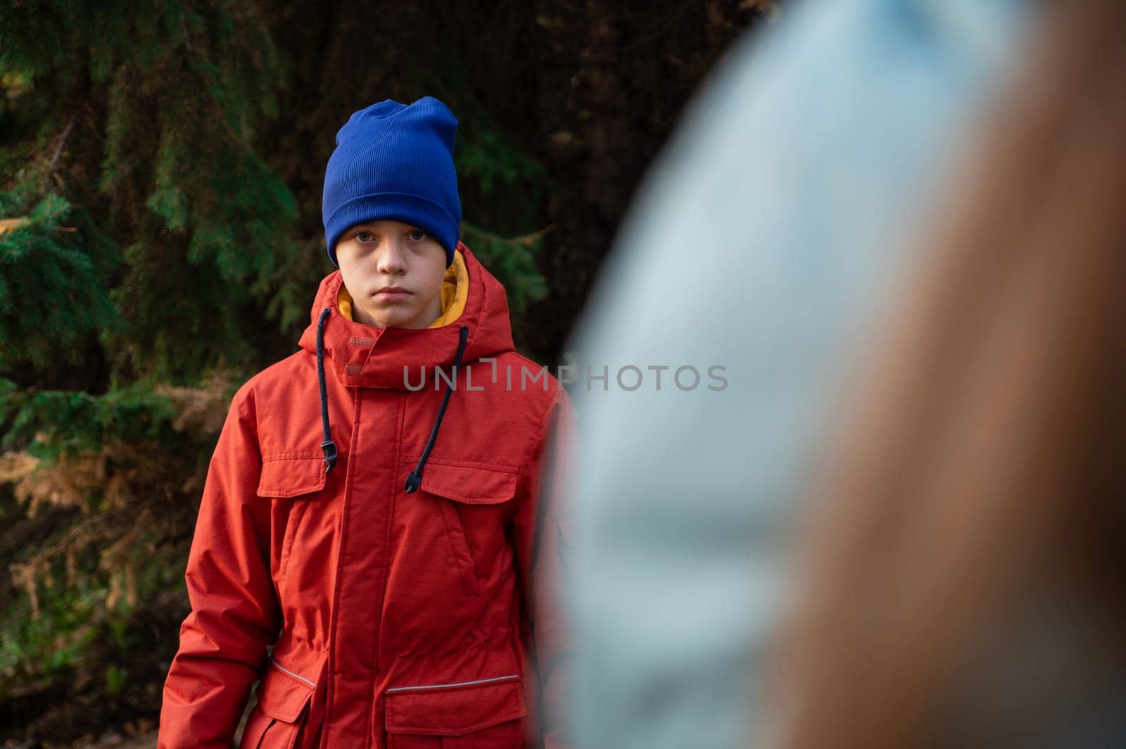 Autumn portrait of boy teen on fall nature background