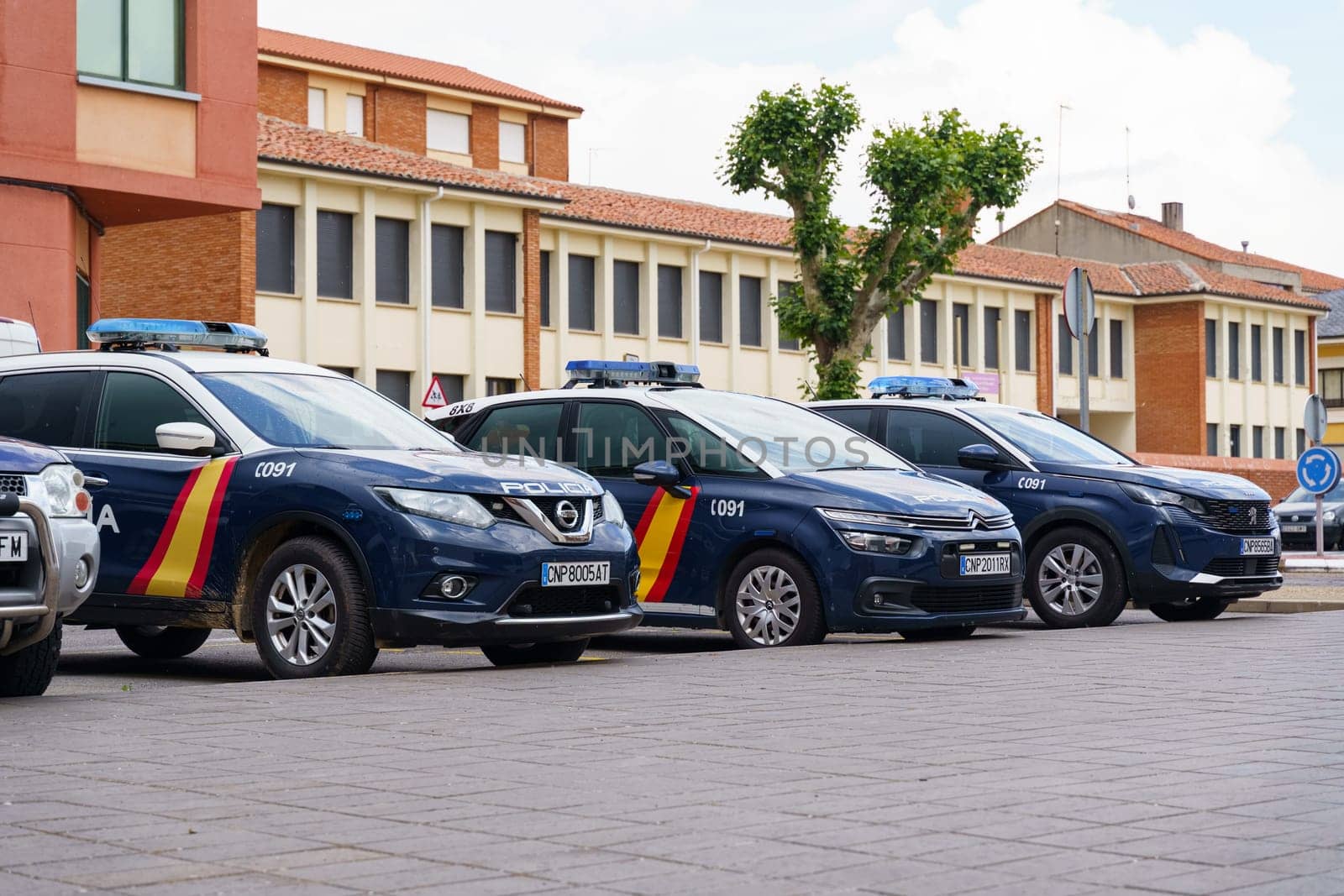 Astorga, Spain - June 4, 2023: Policia Nacional cars parked near the police station.