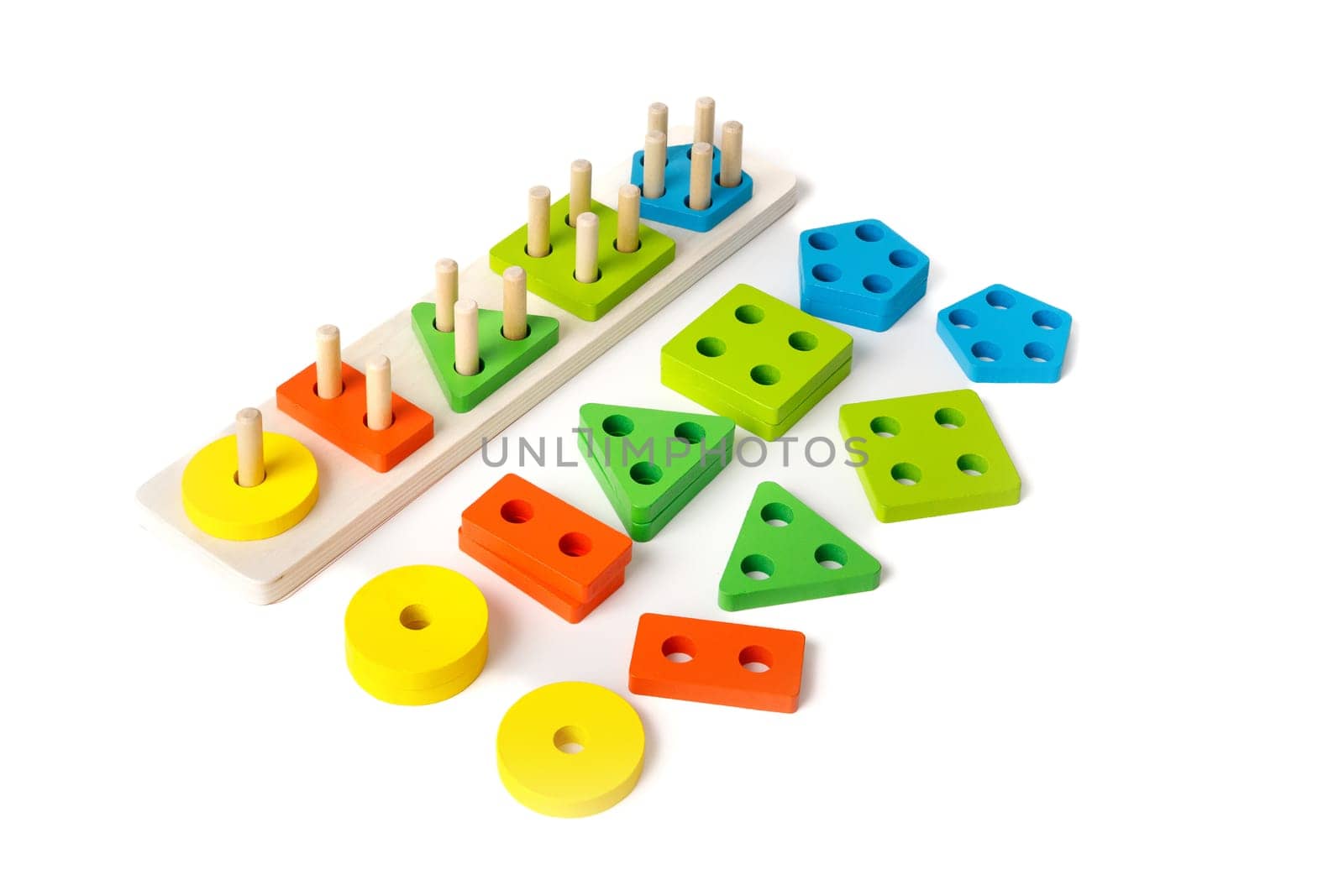Montessori puzzle toy with colorful blocks of different shapes for children education of primary preschool age, isolated on white background.
