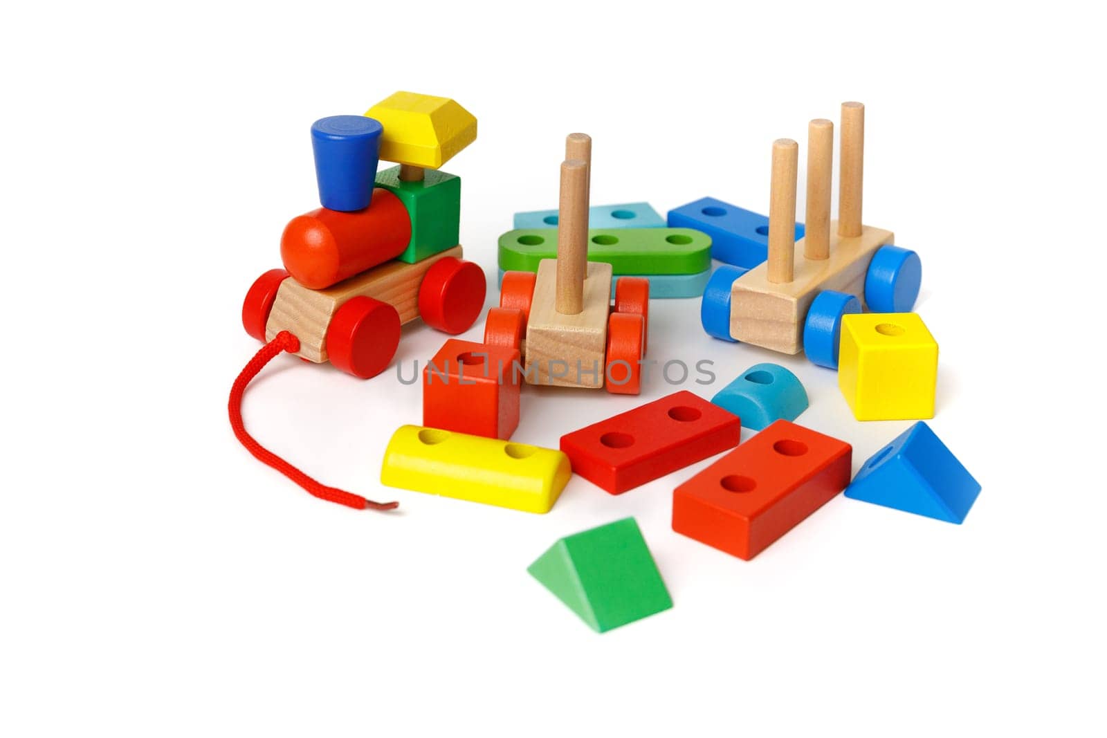 A set of Montessori children's educational toys made from different blocks and puzzles isolated on white background.