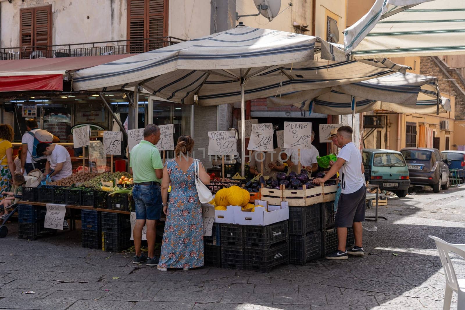 Palermo, Italy - July 20, 2023: Market stalls and people at famous and historical Ballaro Market