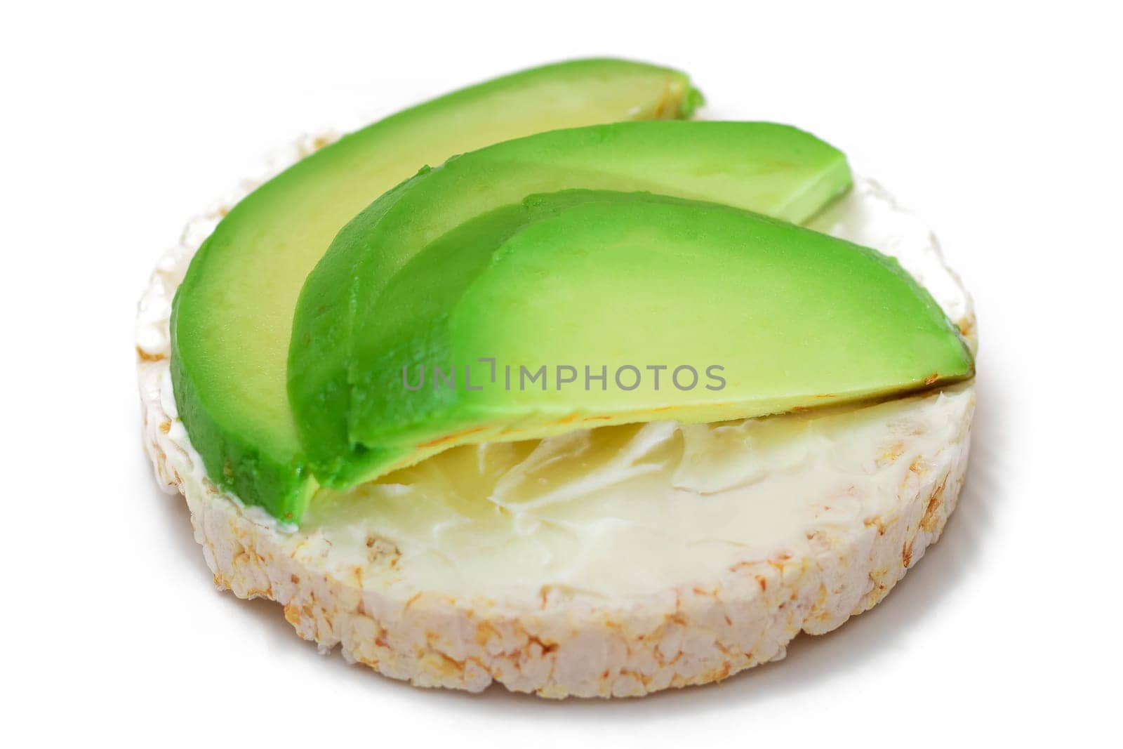 Rice Cake Sandwich with Fresh Avocado and Cream Cheese - Isolated on White. Easy Breakfast. Diet Food. Quick and Healthy Sandwiches. Crispbread with Tasty Filling. Healthy Dietary Snack - Isolation