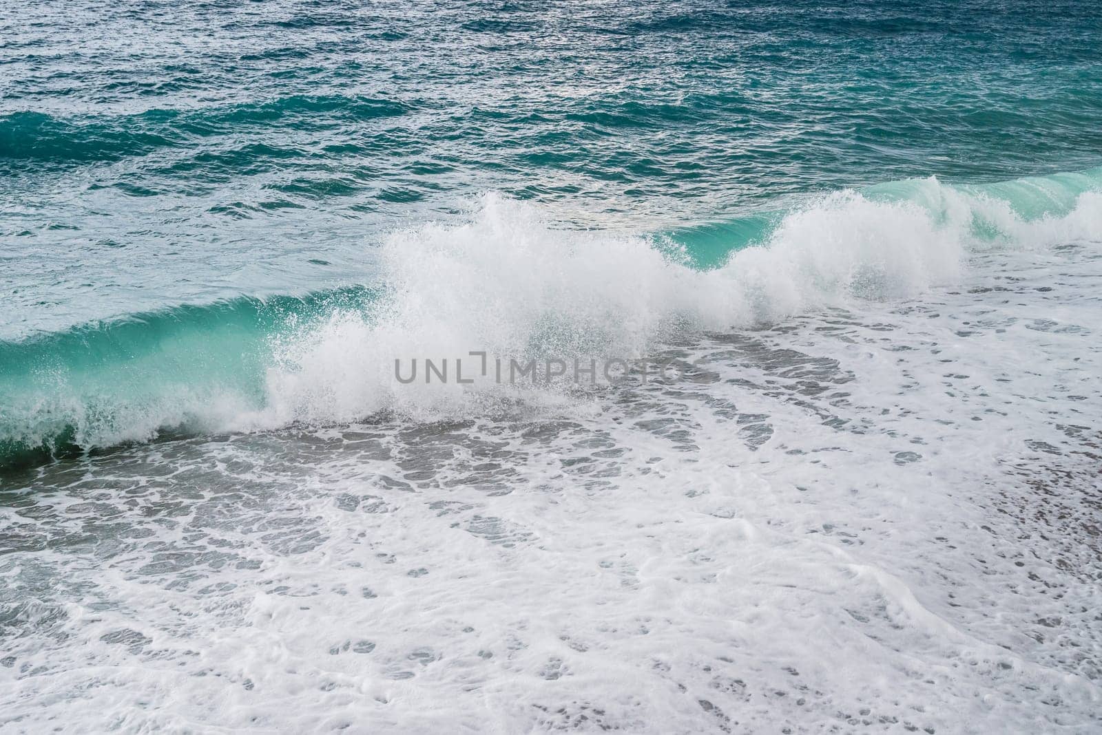 Big waves hitting the Konyaalti coast on a stormy day