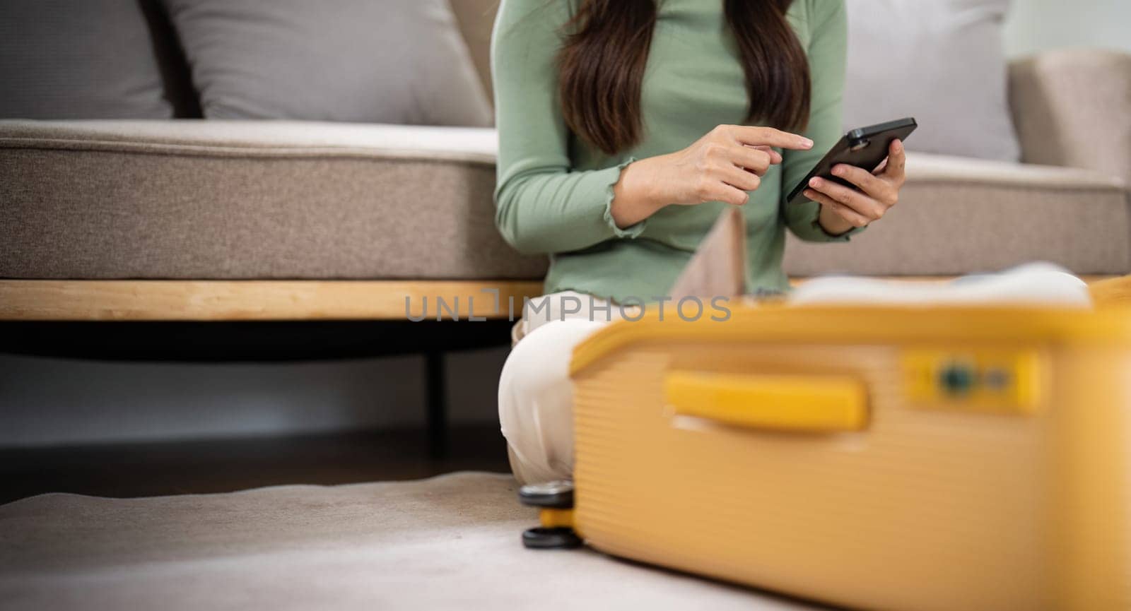 Traveler woman packing prepare stuff and outfit clothes in suitcases travel bag luggage for holiday at home, weekend, tourist, journey.