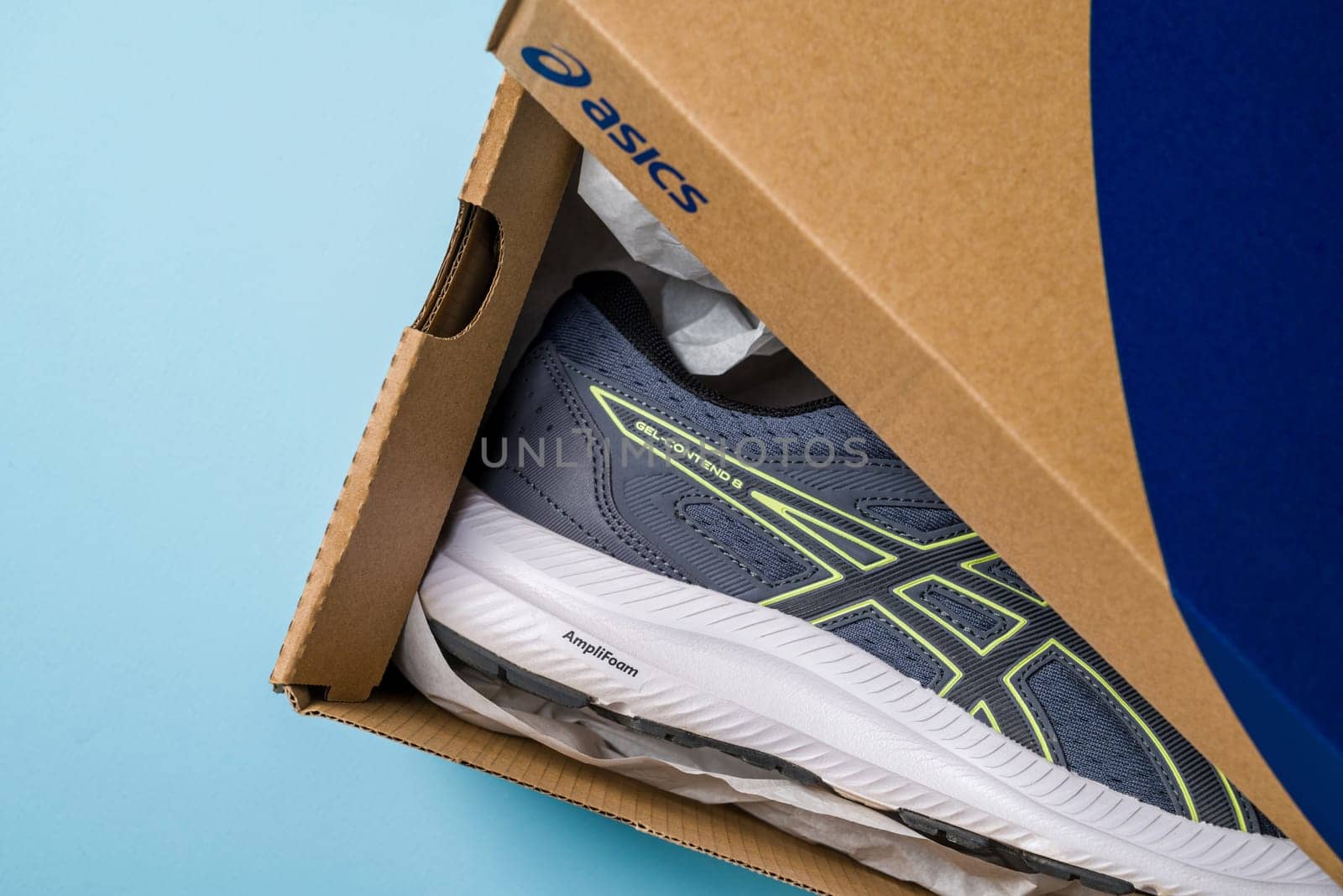 Antalya, Turkey - November 28, 2023: Asics running shoes with new technology soles in shoe box by Sonat