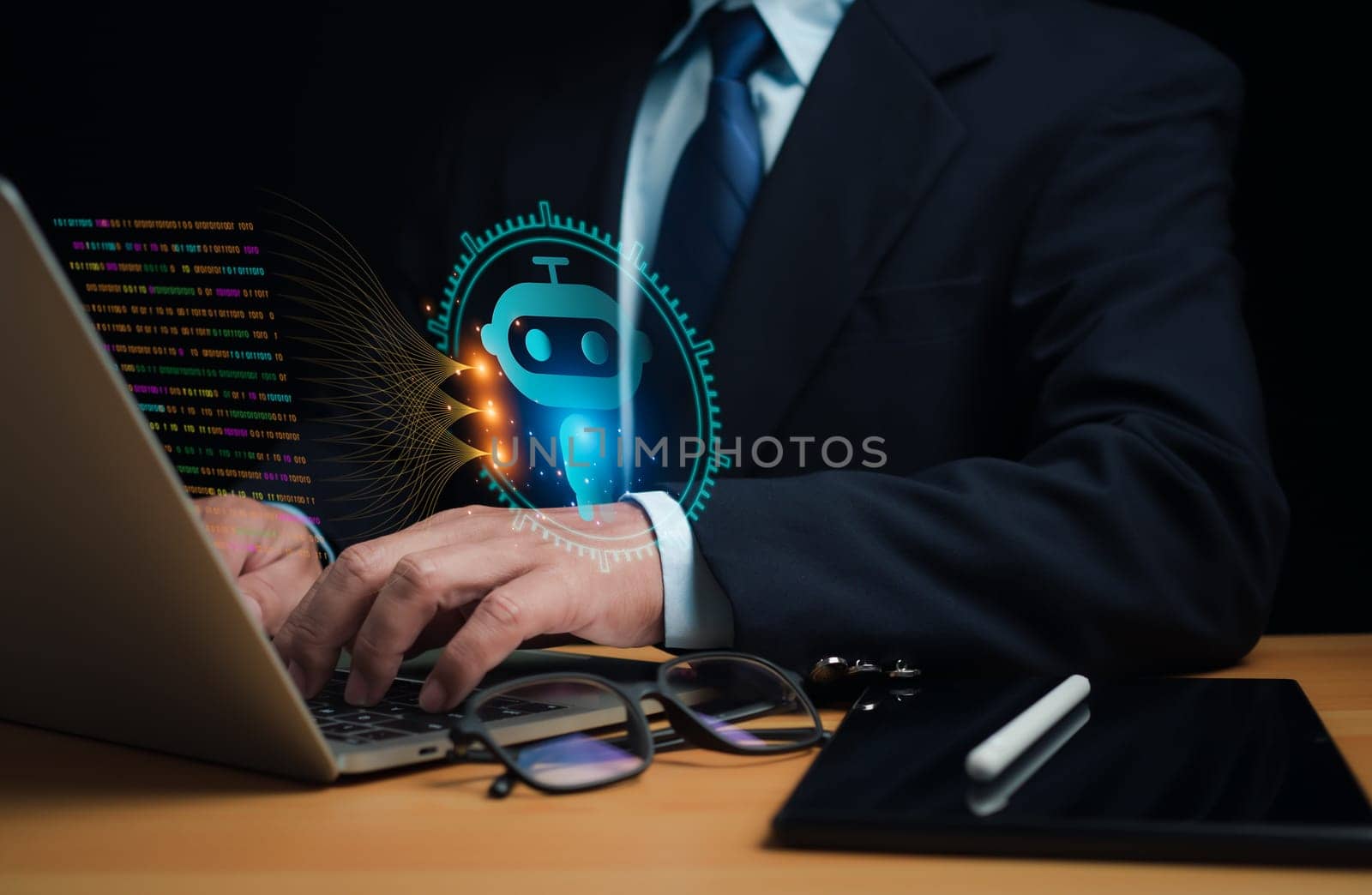 Businessman uses computer to type chat Ask and answer with the artificial intelligence system, chatbot, AI assistant. by Unimages2527