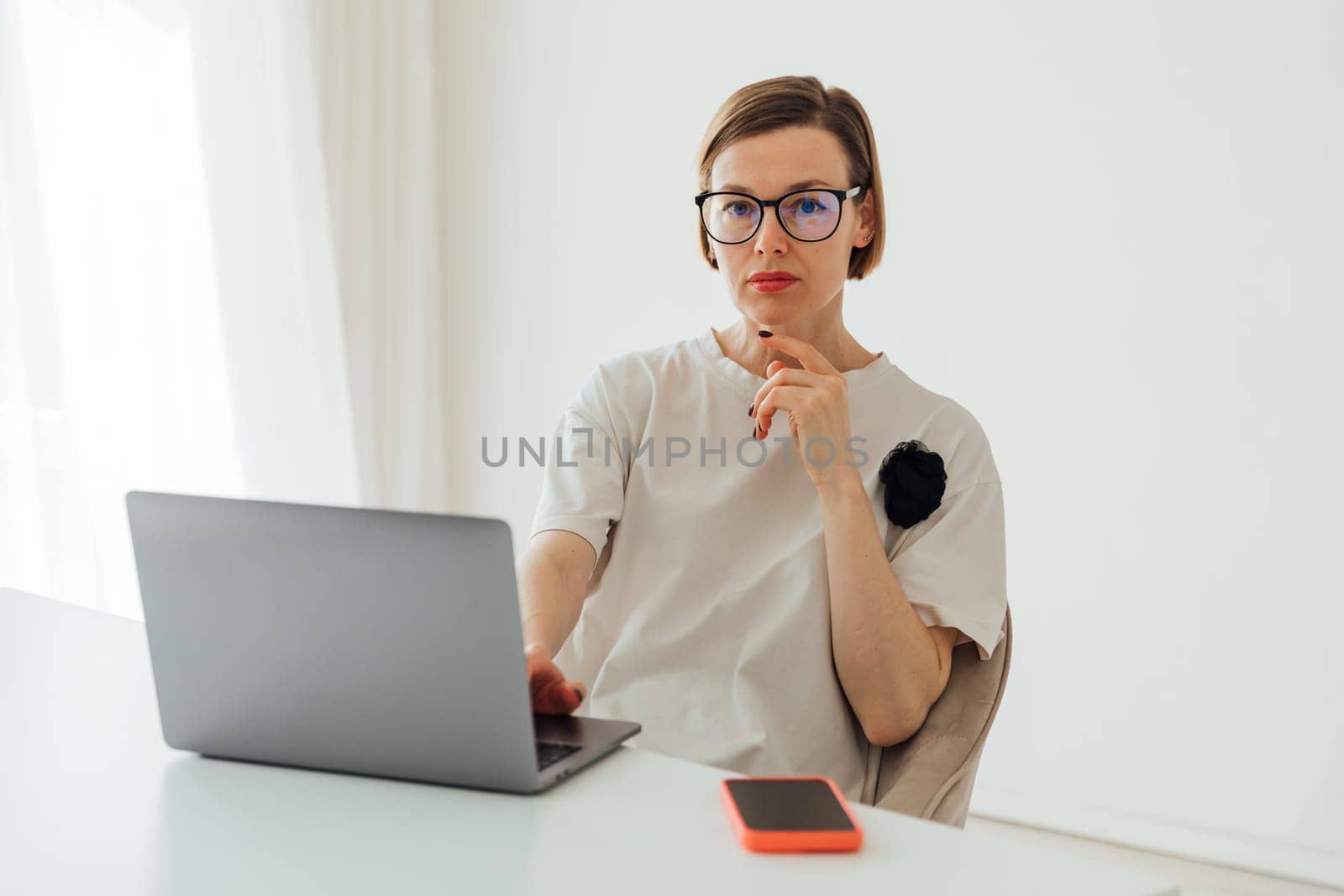 woman working online at computer in office