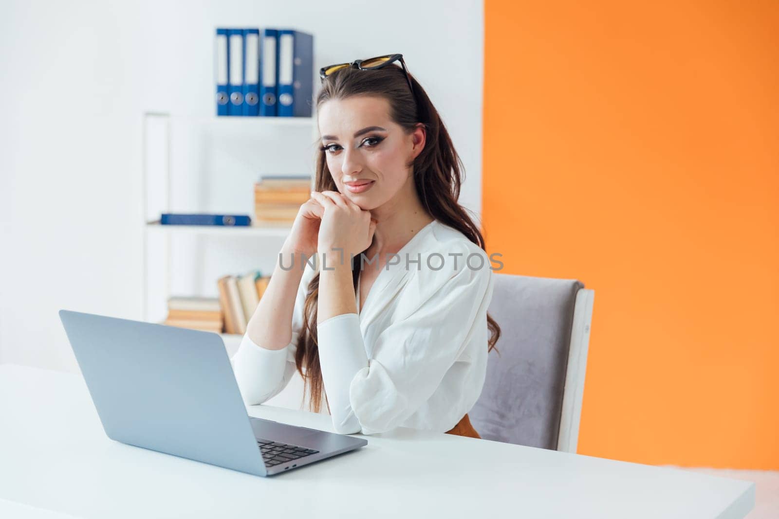 woman working at computer office office online