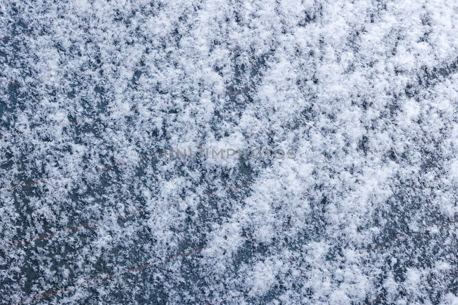 snow covered car windshield under daylight texture and background