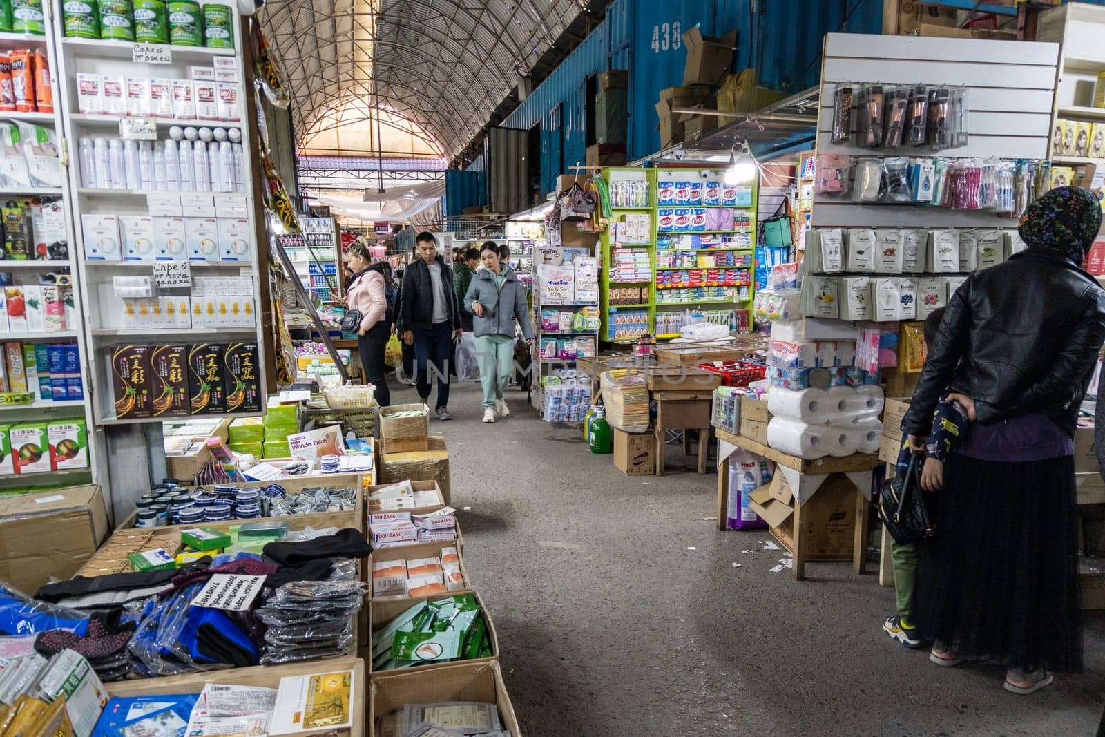 Asian health and cosmetic products on Dordoi Bazaar under roof in Bishkek, Kyrgyzstan by z1b