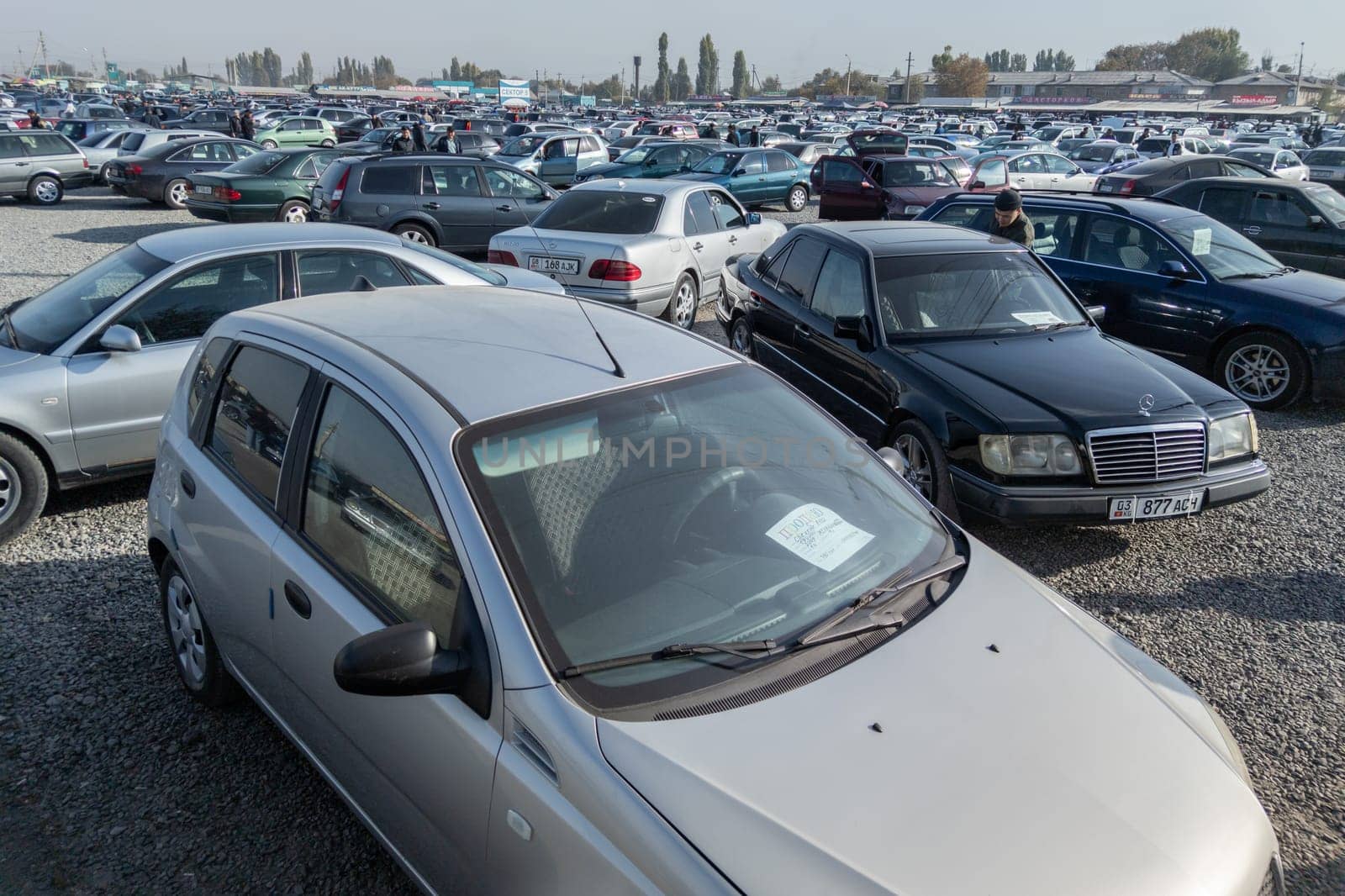 Large used car open air market RIOM Auto in Bishkek, Kyrgyzstan at October 16, 2022