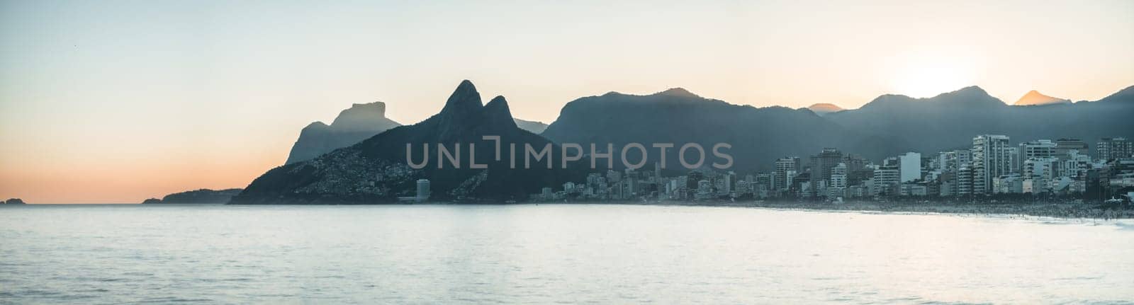 Mystic Sunset Over Ipanema Beach with Favelas and Mountain Silhouettes by FerradalFCG