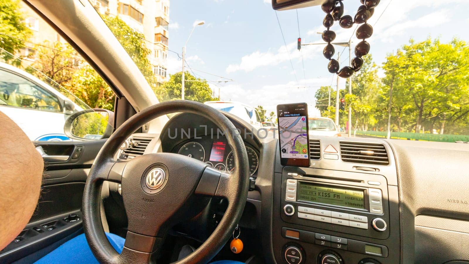 Smartphone showing Waze maps to show the way thru the city by vladispas