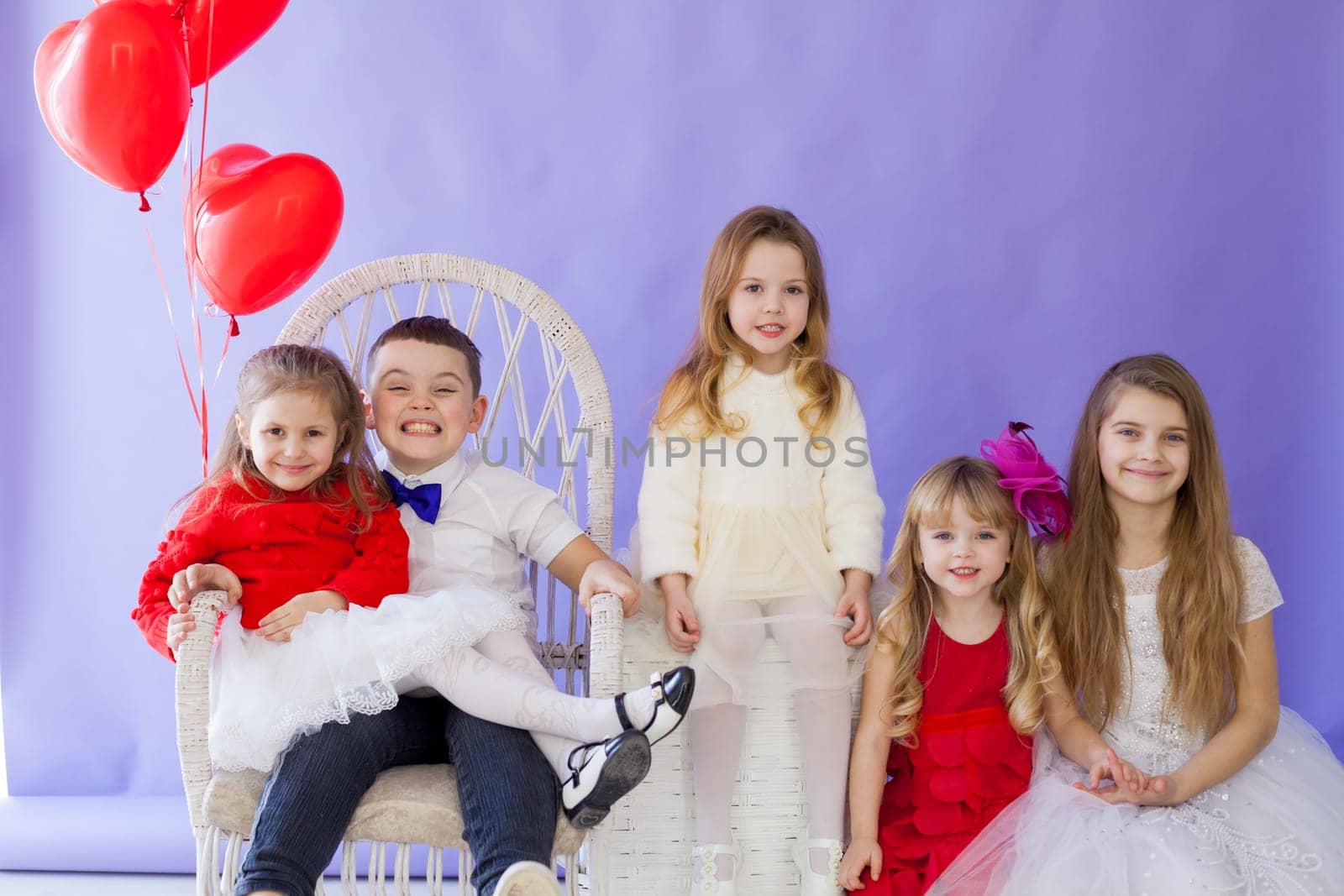 Kids boy and girls friends with balloons