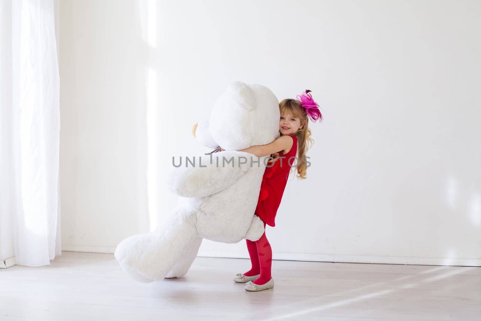 Beautiful girl with toy teddy bear gift by Simakov