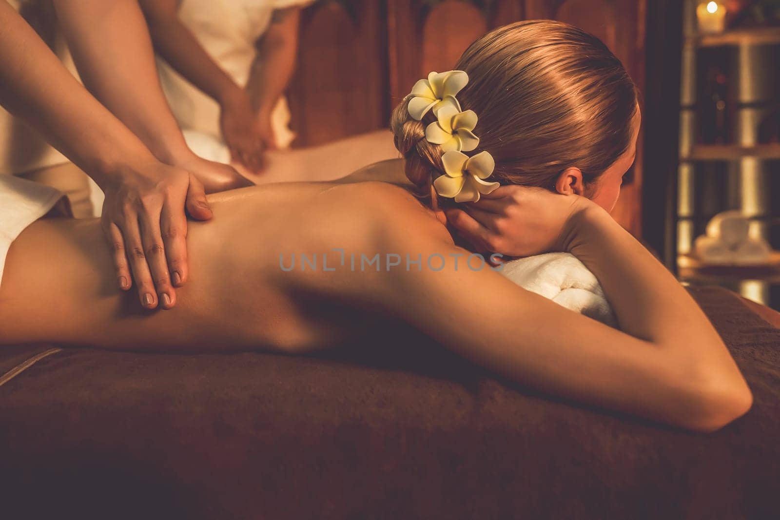 Caucasian couple customer enjoying relaxing anti-stress massage. Quiescent by biancoblue