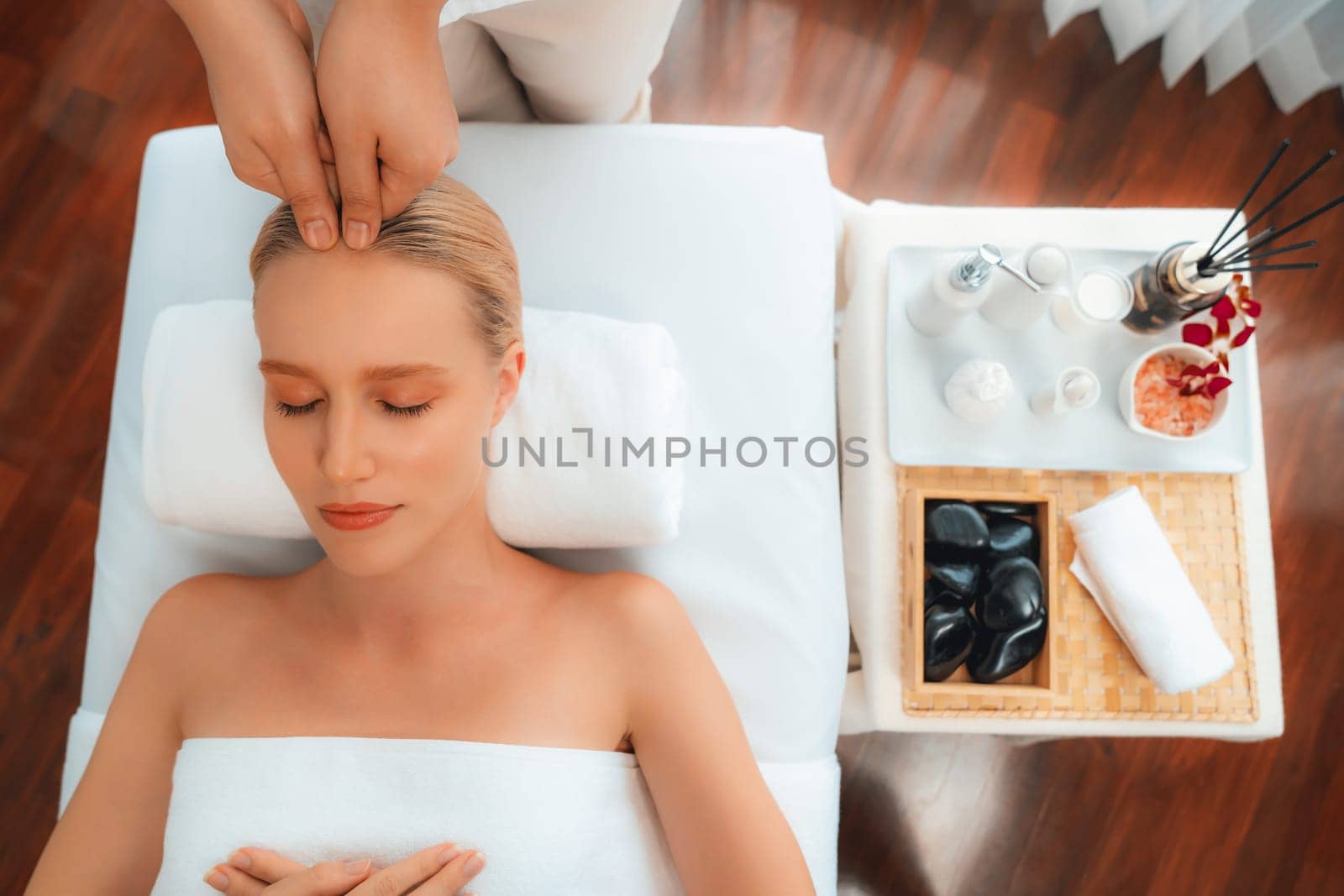 Panorama top view woman enjoying relaxing anti-stress head massage. Quiescent by biancoblue