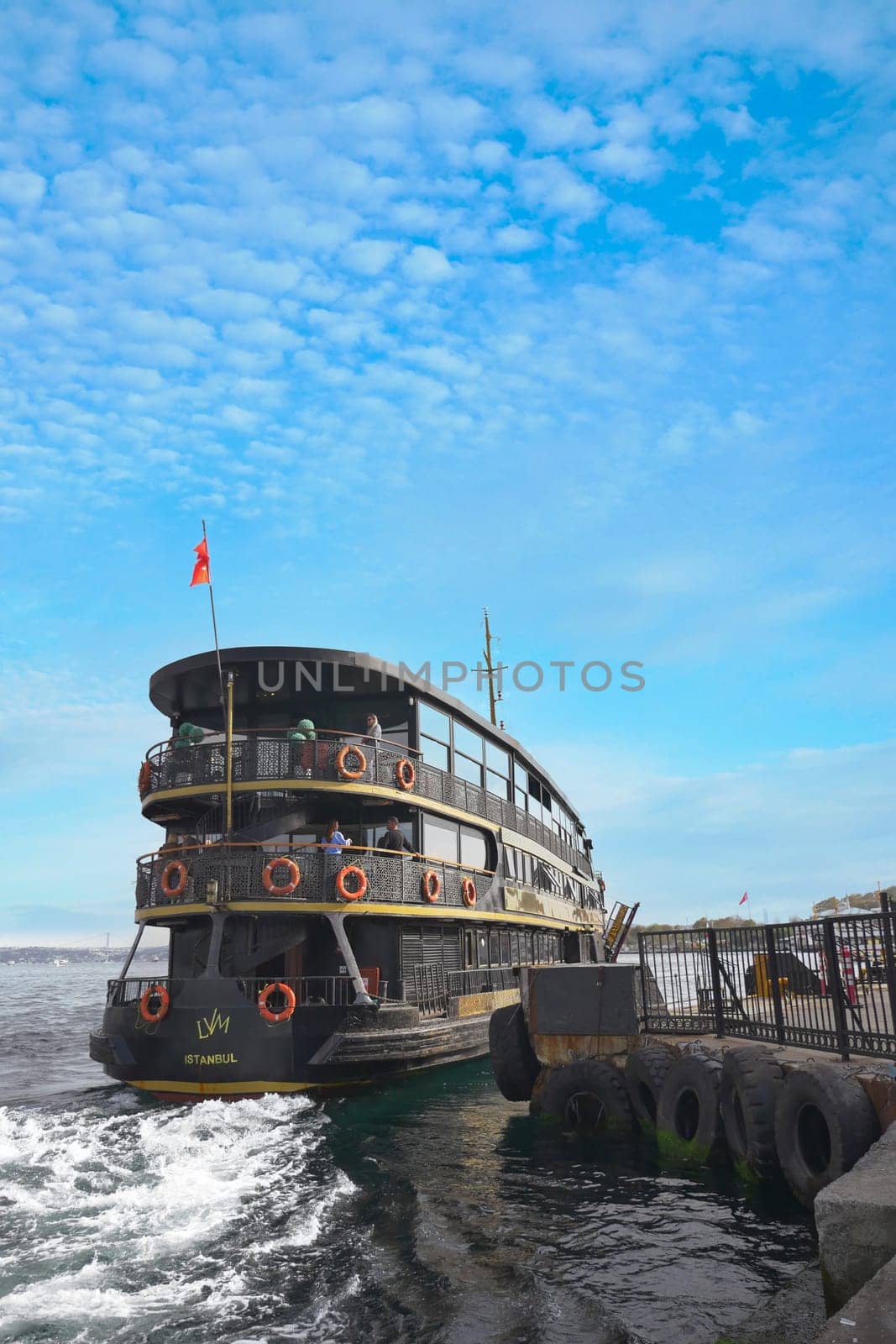 Turkey istanbul 18 july 2023. Transport ferry in the Bosphorus. Ferryboat carries passengers by towfiq007