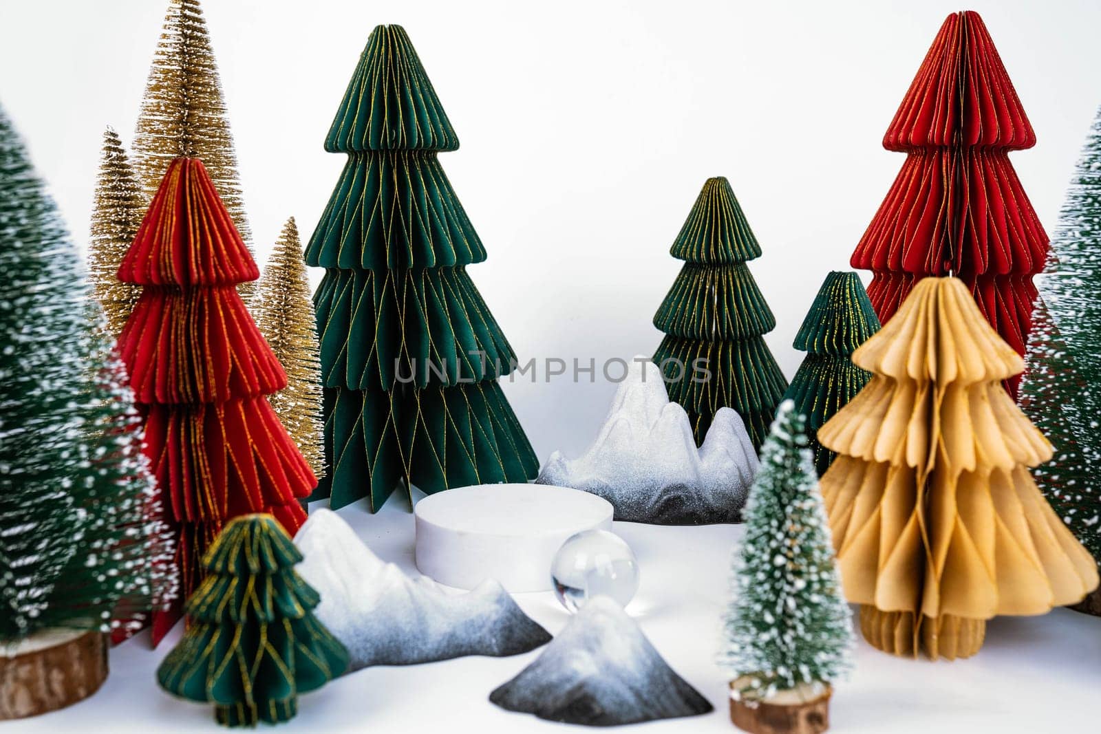 New Year's concept, product stand. Colored Christmas trees. by tewolf