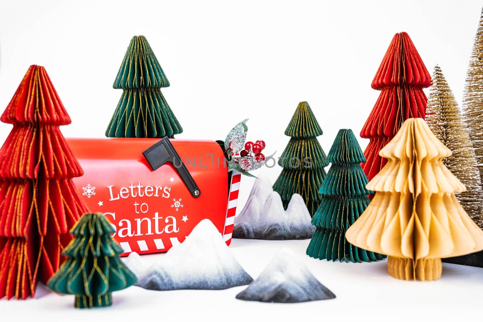 New Year's background for a product or card. Colored Christmas trees, Santa Claus mailbox. High quality photo