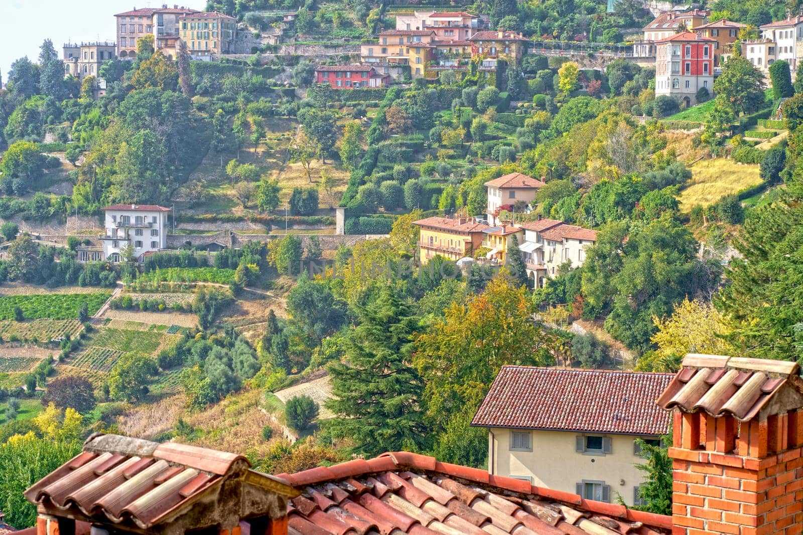 City on the hills. View at Old Town Citta Alta of Bergamo from San Vigilio Hill. Bergamo, Italy by aprilphoto