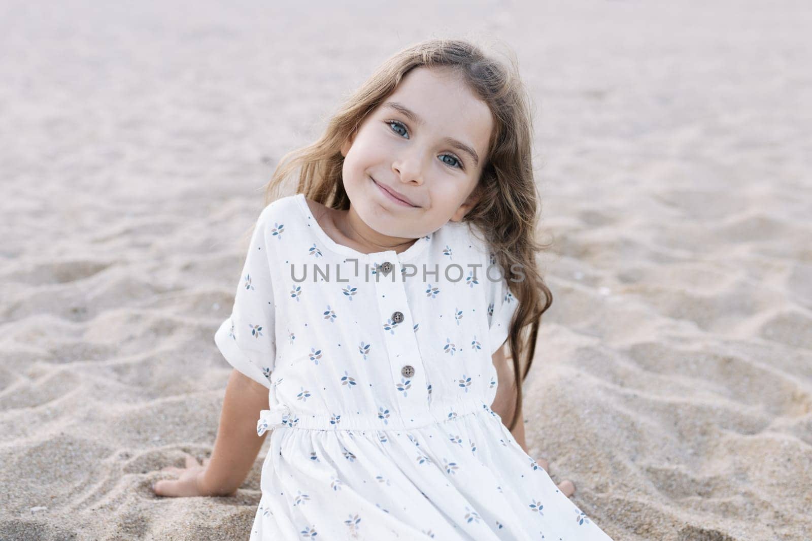 Little girl enjoying summer vacation at the sea.