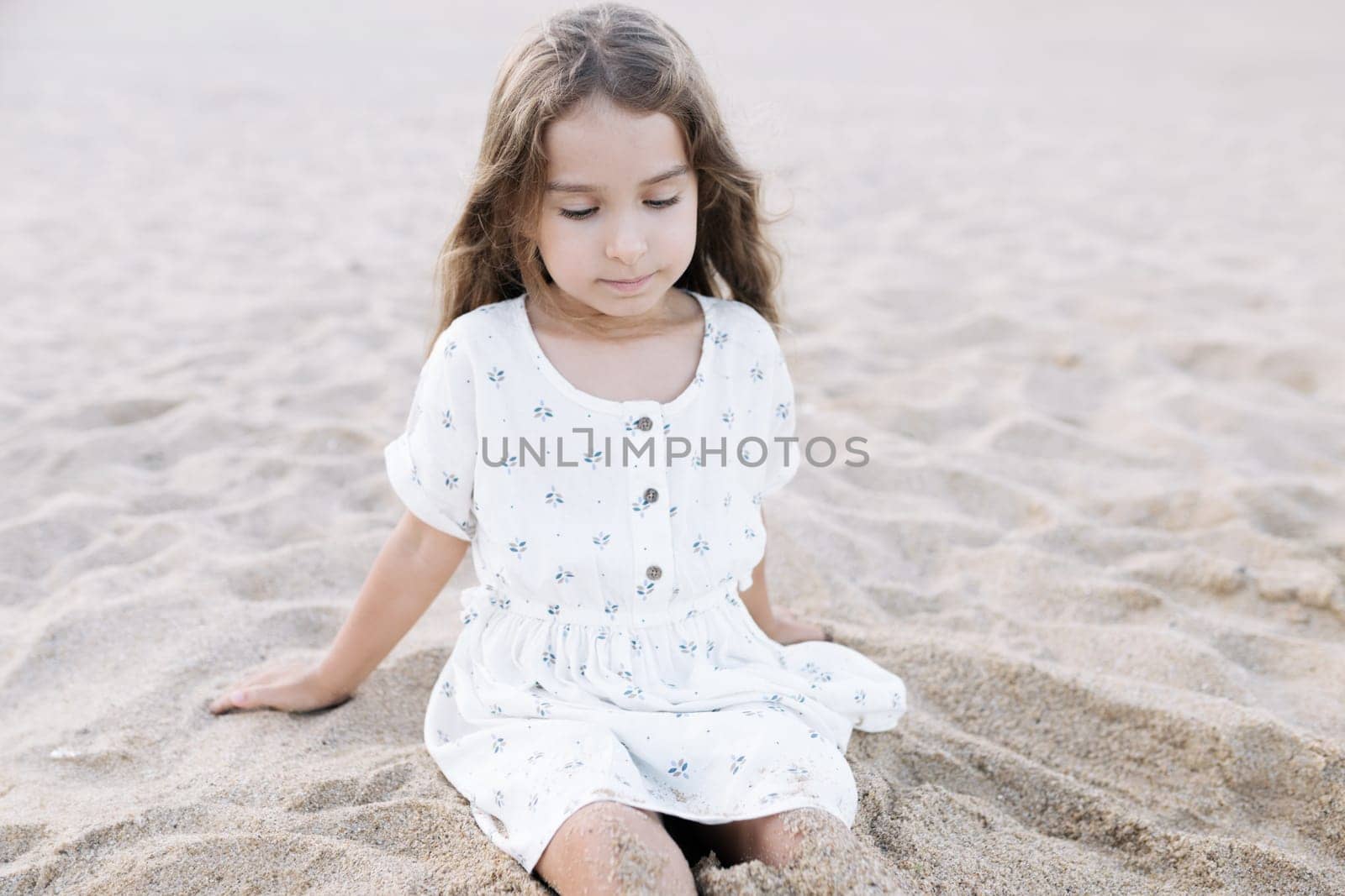 Little girl enjoying summer vacation at the sea by malyshph