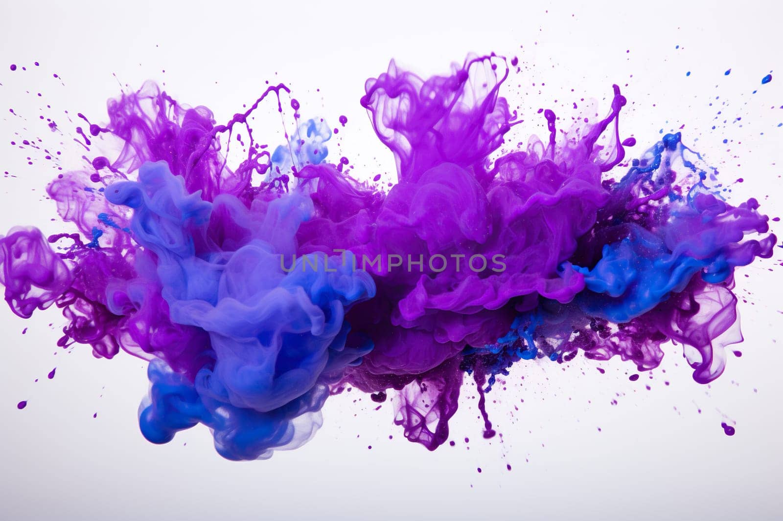 Purple ink in water. Splash of purple color on a white background. Abstract color background.
