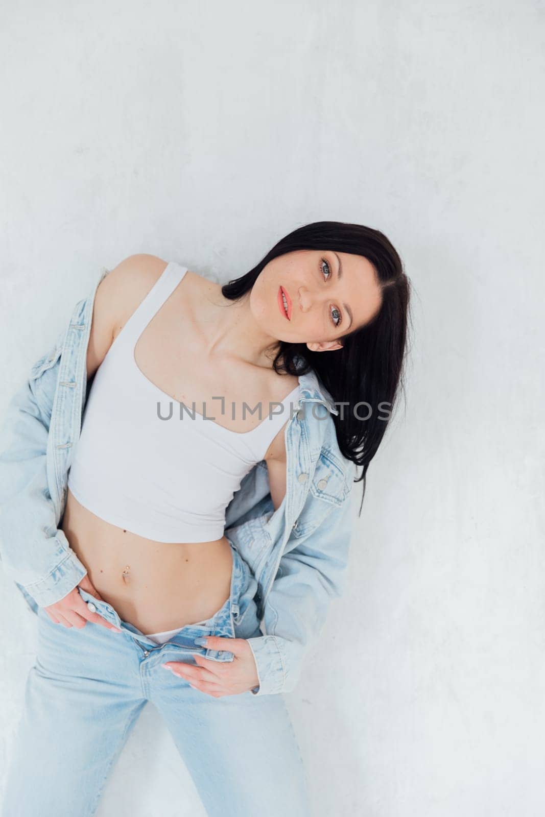 Portrait of a beautiful slender young brunette woman
