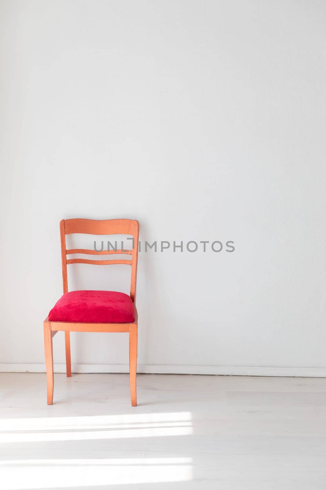 red vintage chair in white room interior by Simakov