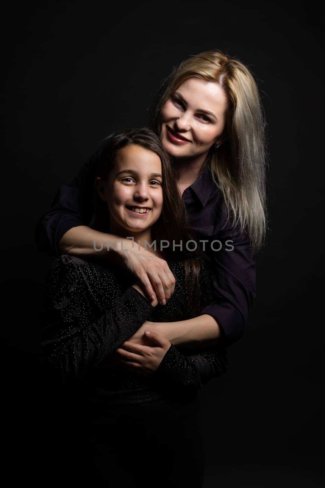 portrait of young woman with her little girl by Andelov13