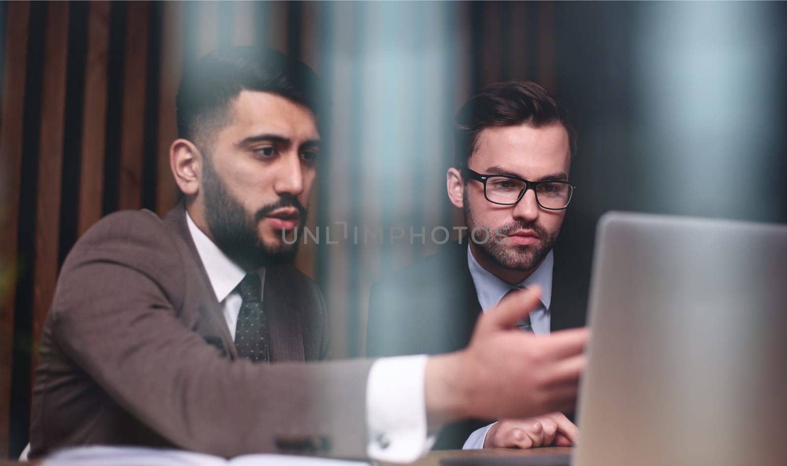 Young business male meeting with a colleague in office at work