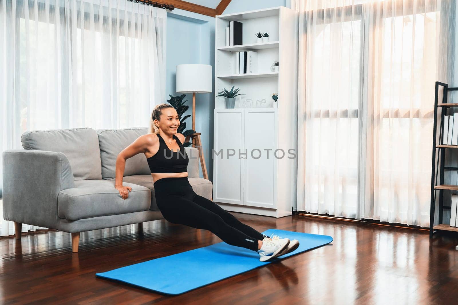 Athletic and active senior woman using furniture for pushup. Clout by biancoblue