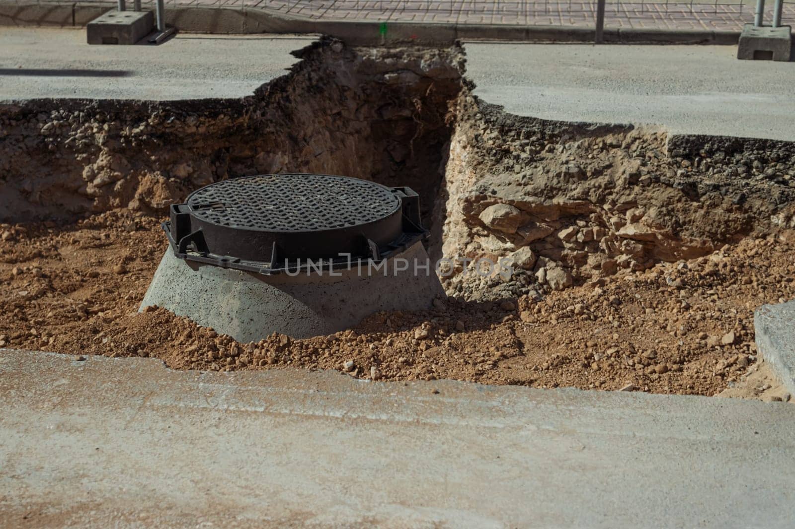 Street repair in the city, Large piles of earth and broken asphalt, road repair concept. High quality photo