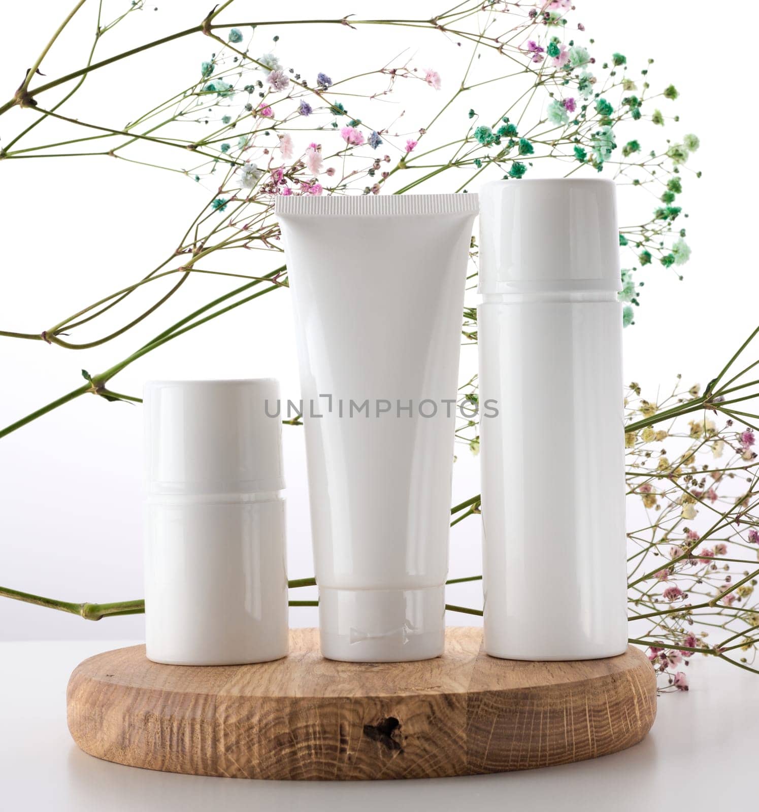 Bottle, empty white plastic tubes for cosmetics. Packaging for cream, gel, serum, advertising and product promotion, mock up