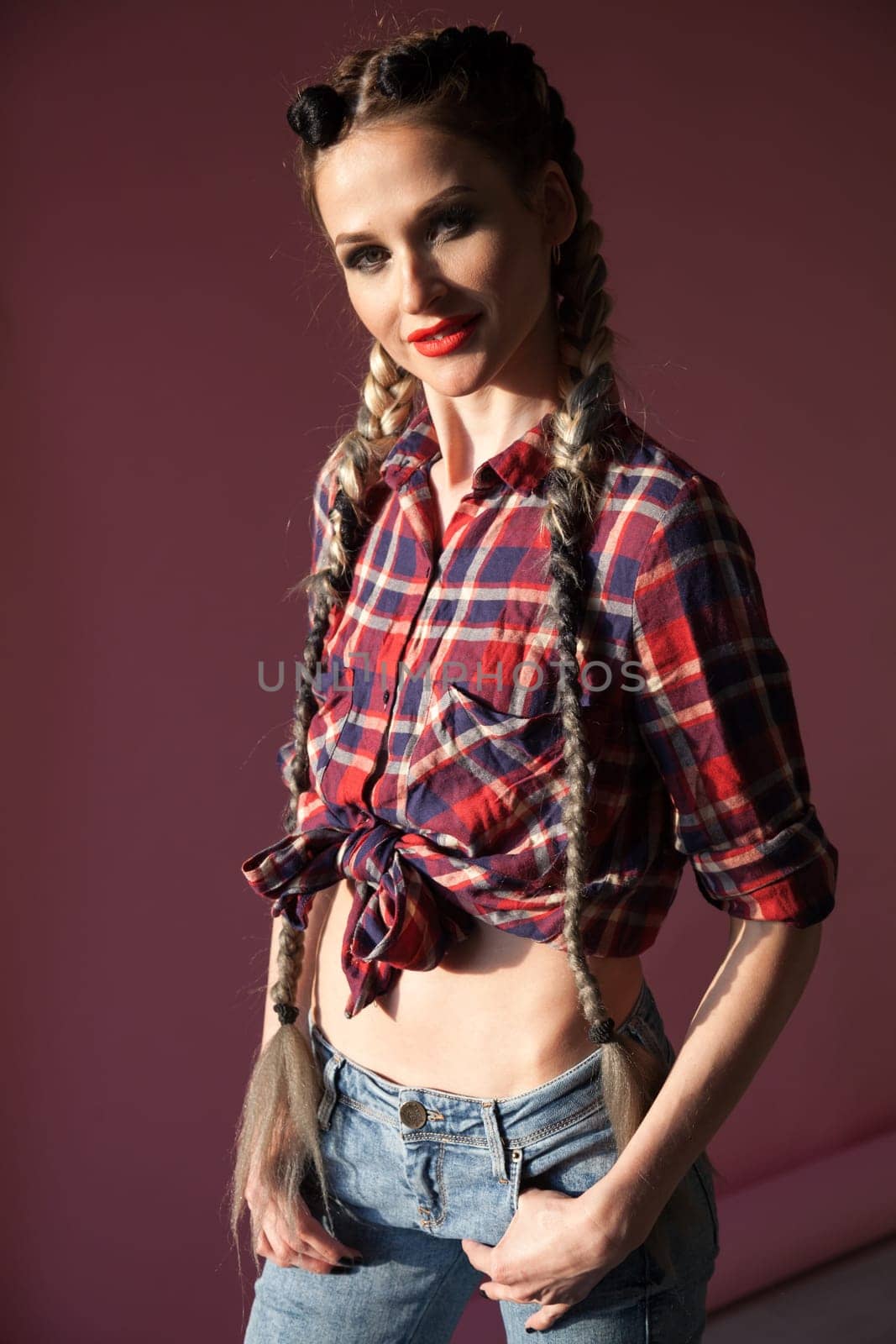 portrait of a fashionable woman with two braids