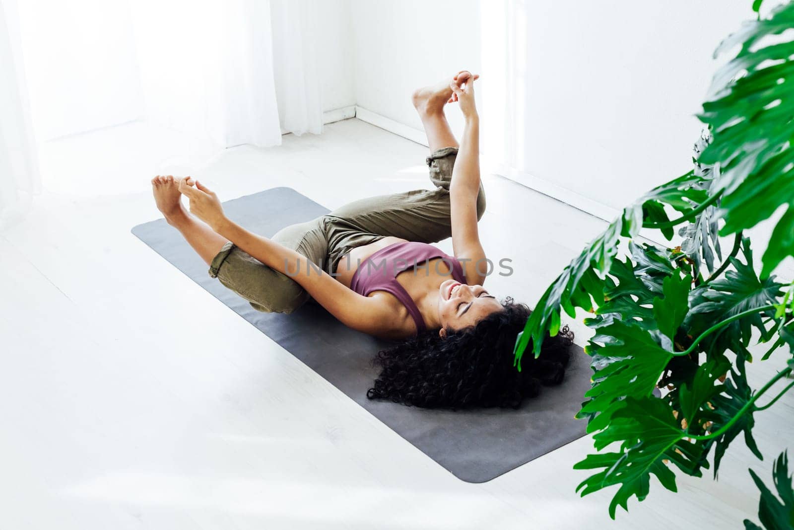 Female engaged in yoga fitness asana body flexibility