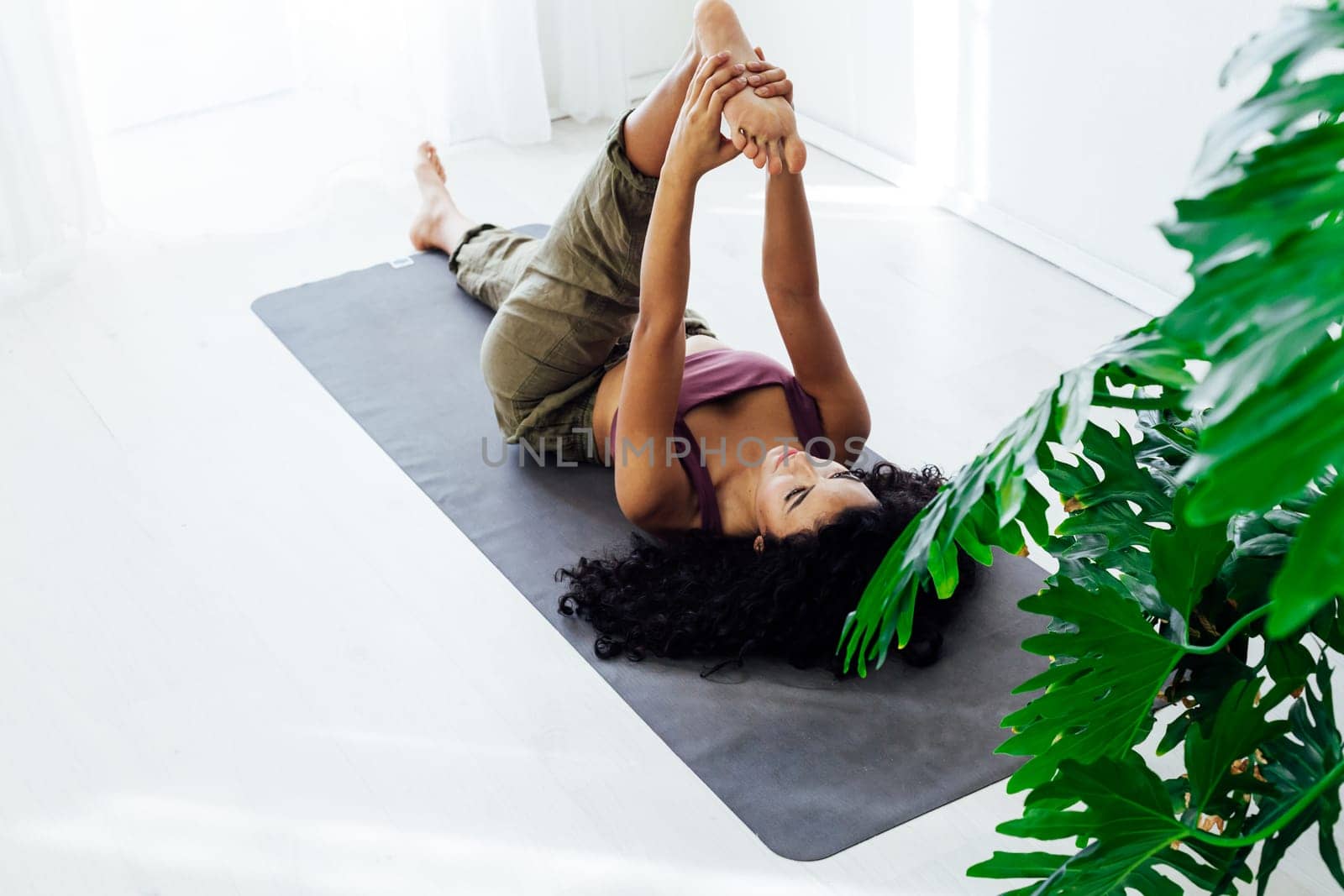 Female engaged in yoga fitness asana body flexibility