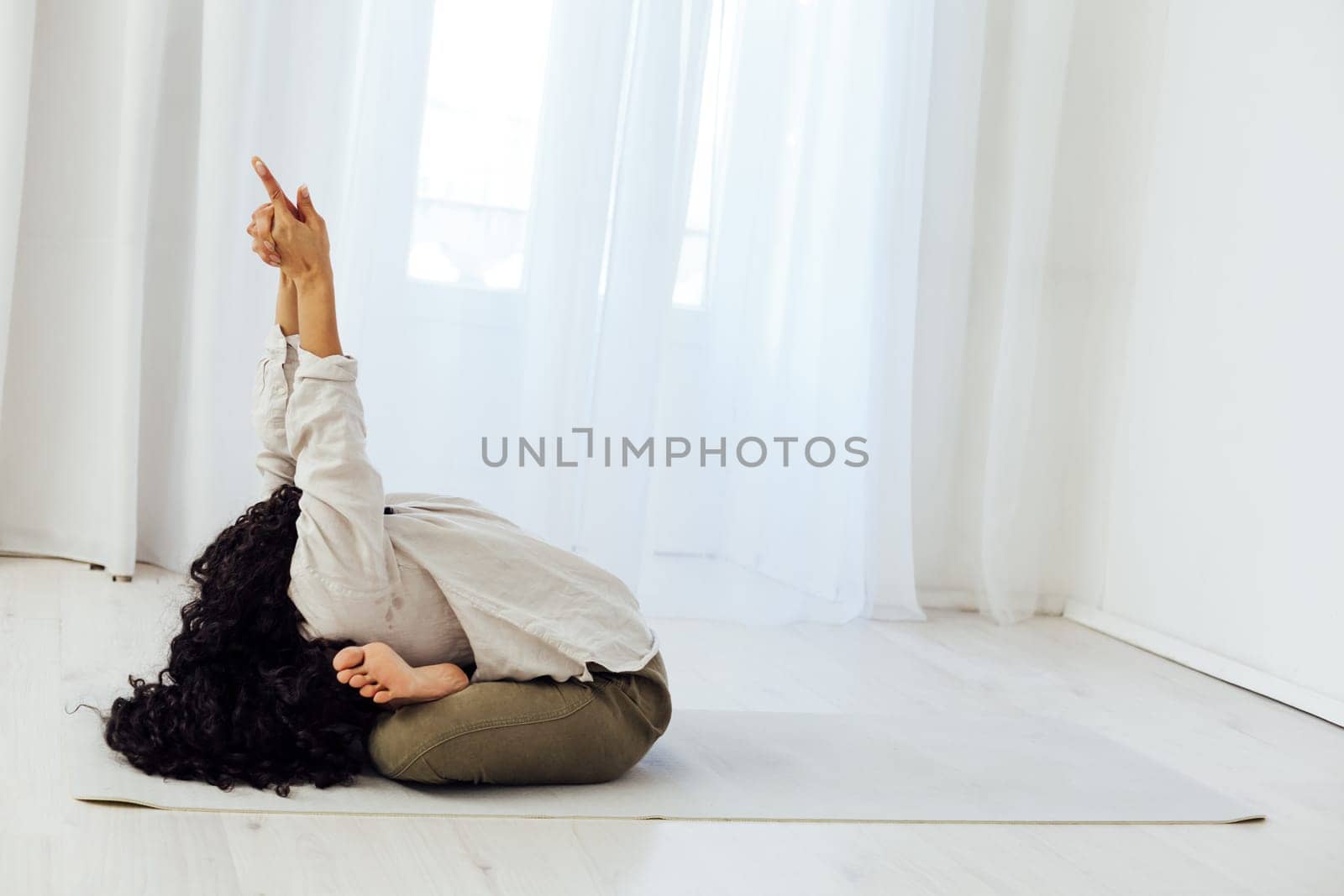 Female engaged in yoga asana gymnastics sport