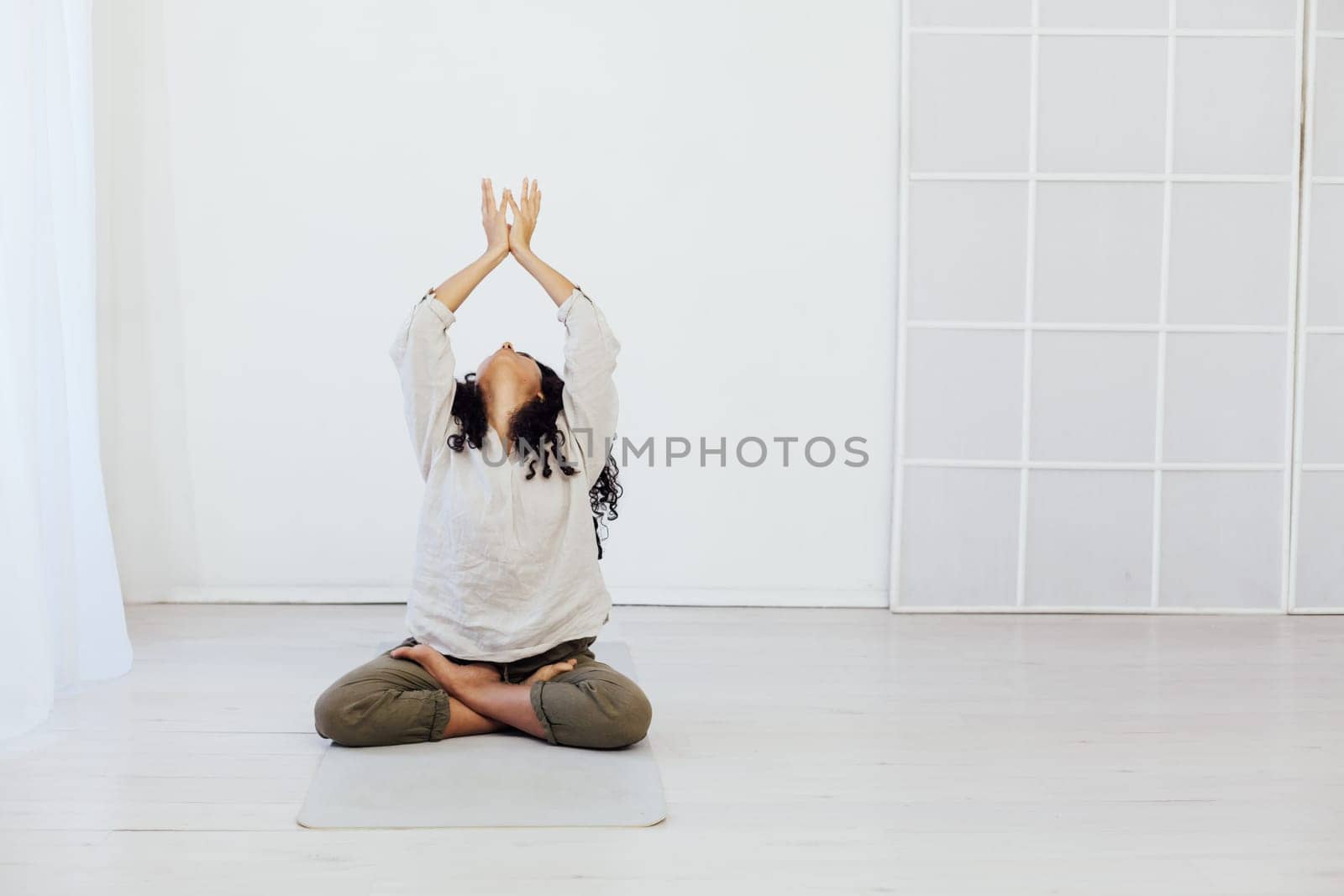 Female engaged in yoga asana gymnastics sport