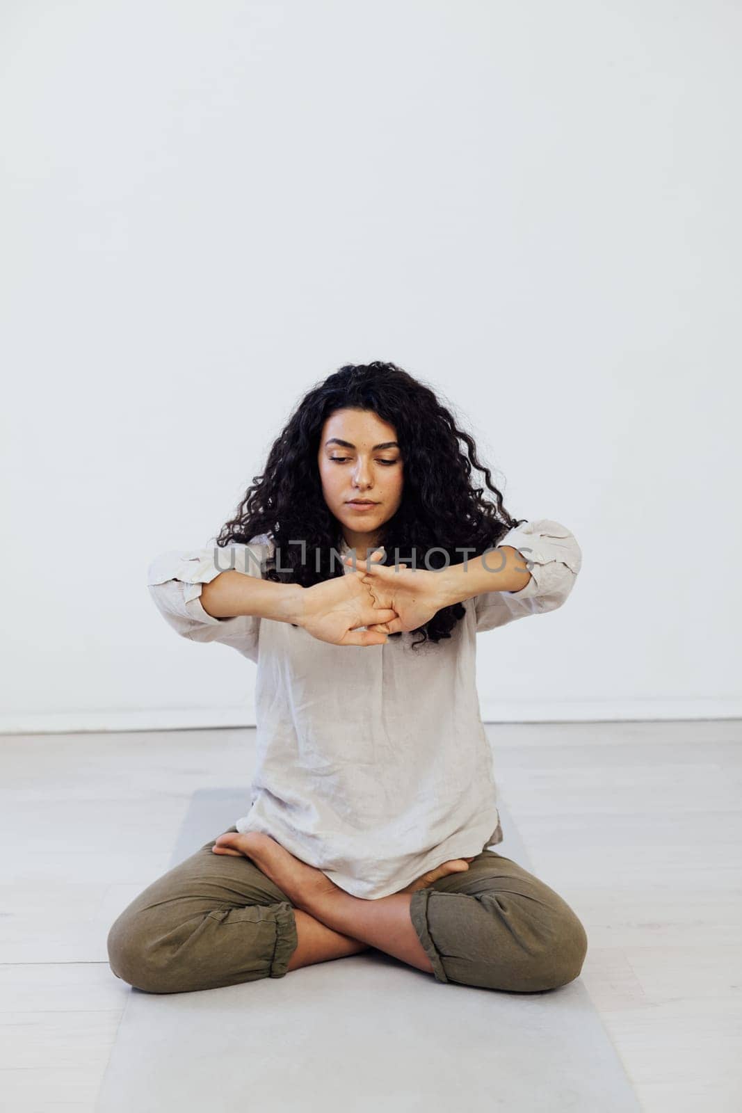 Female engaged in yoga asana gymnastics sport