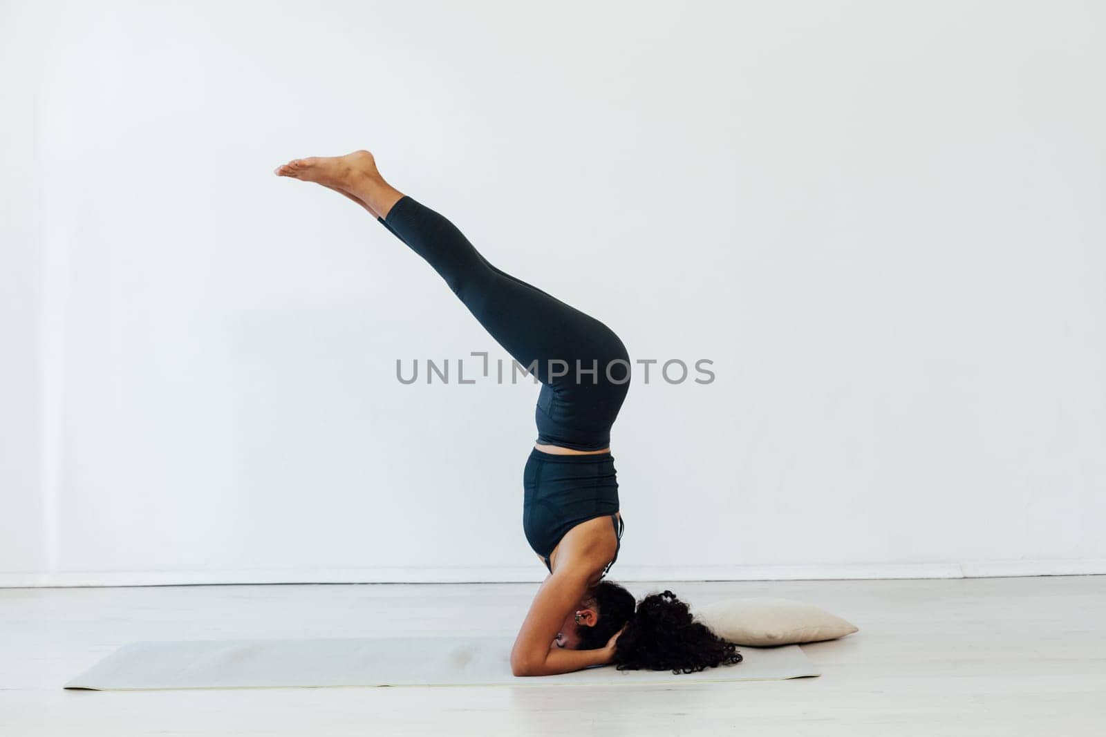 woman yoga asana gymnastics flexibility body fitness by Simakov